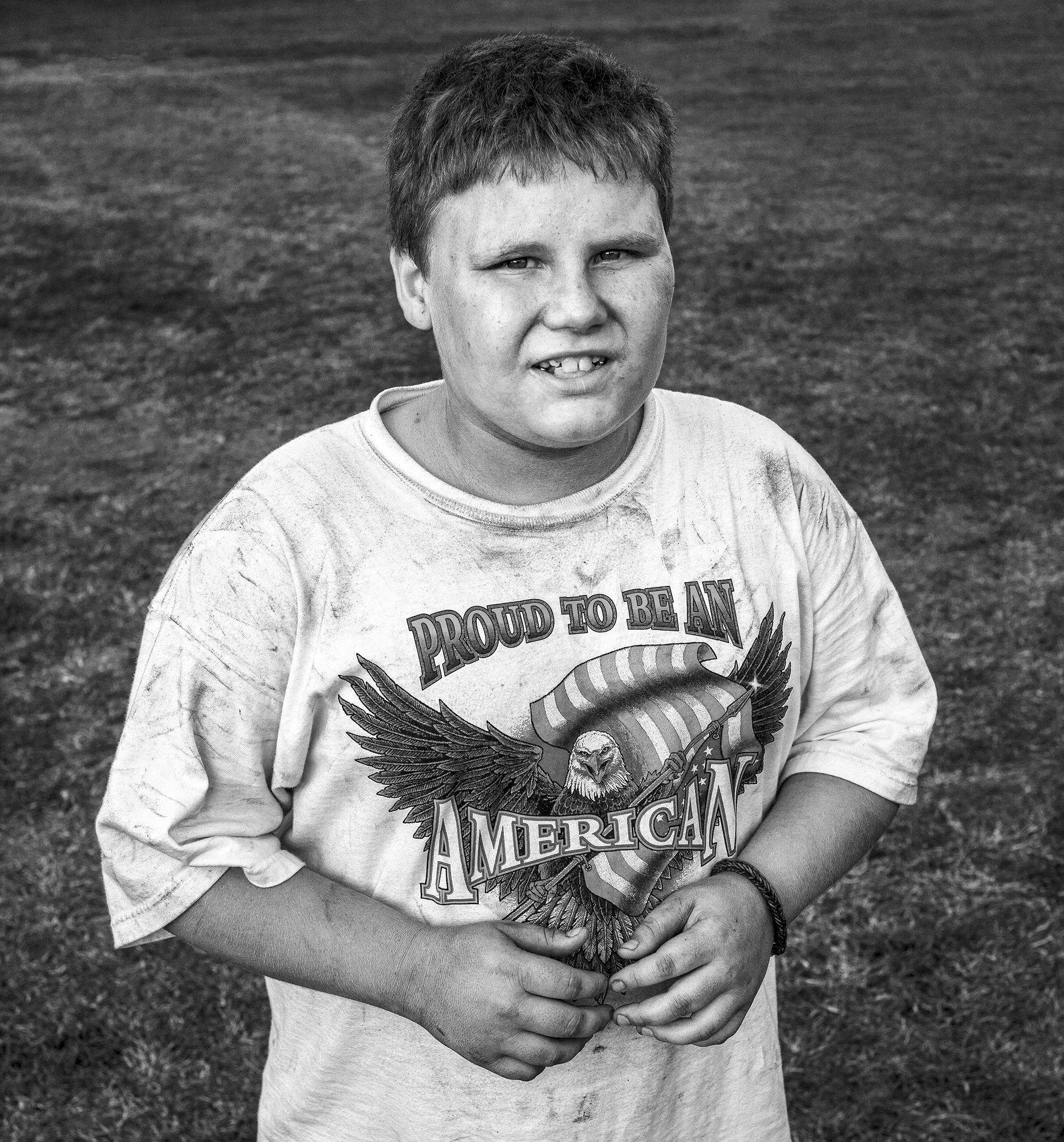 Young Demolition Derby spectator, Carthage Fairgrounds. 2014.