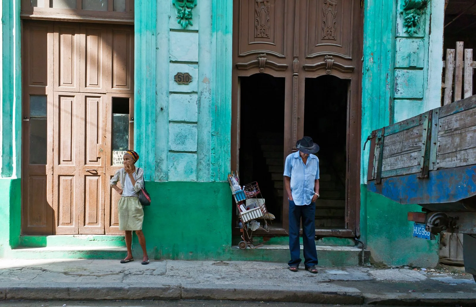 People on a side street, Havana.