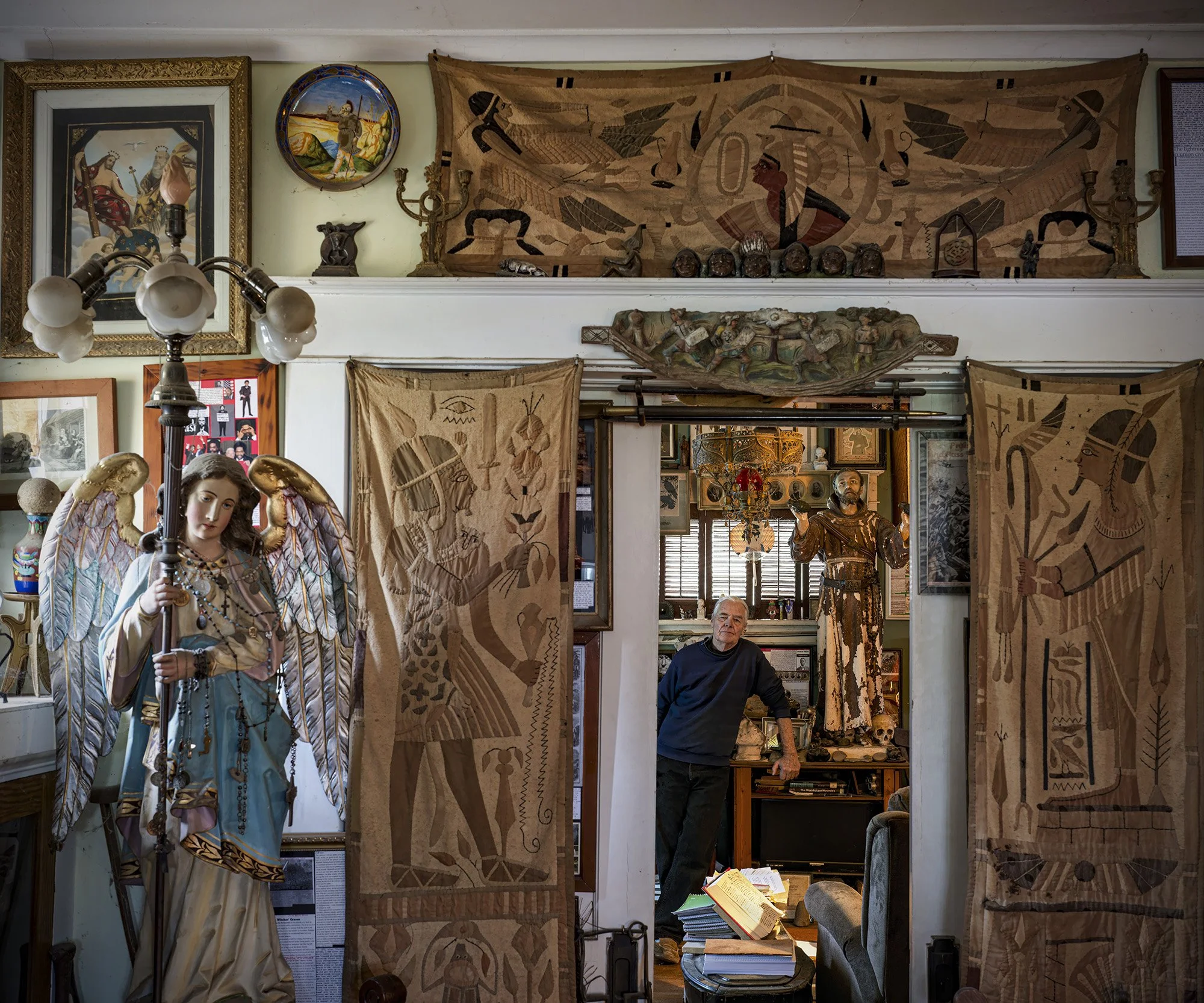 Jim Bowsher in his home with some of the thousands of historical objects he collected. Wapakoneta, Ohio. 2023.