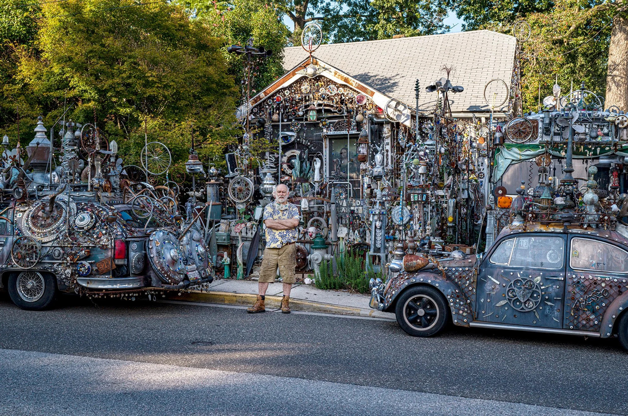 Clarke Bedford in front of his home with three of his vehicles. Hyattsville, Maryland. 2020.