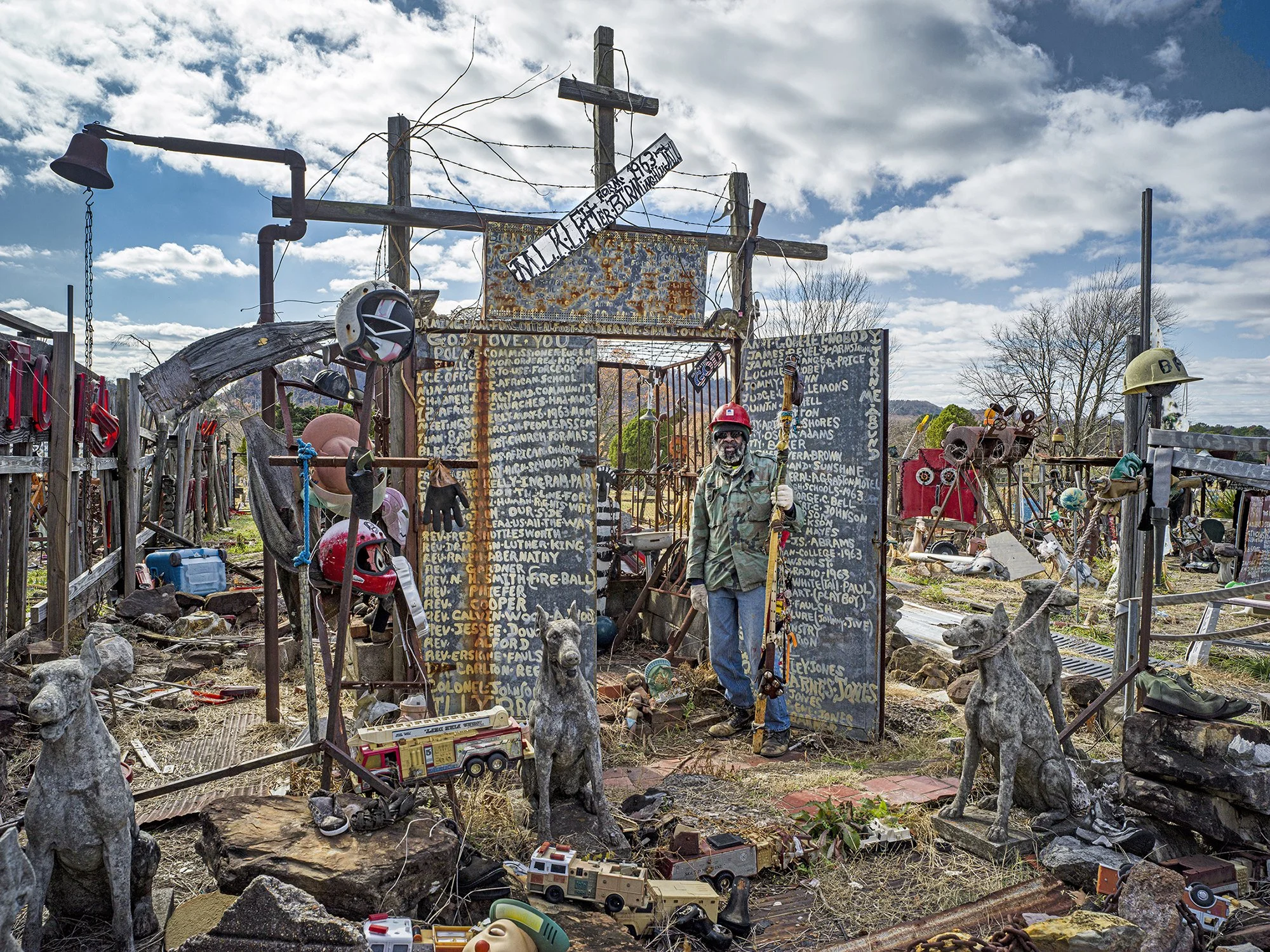 Joe Minter stands in his half-acre “African American Village in America.” Birmingham, Alabama. 2019.