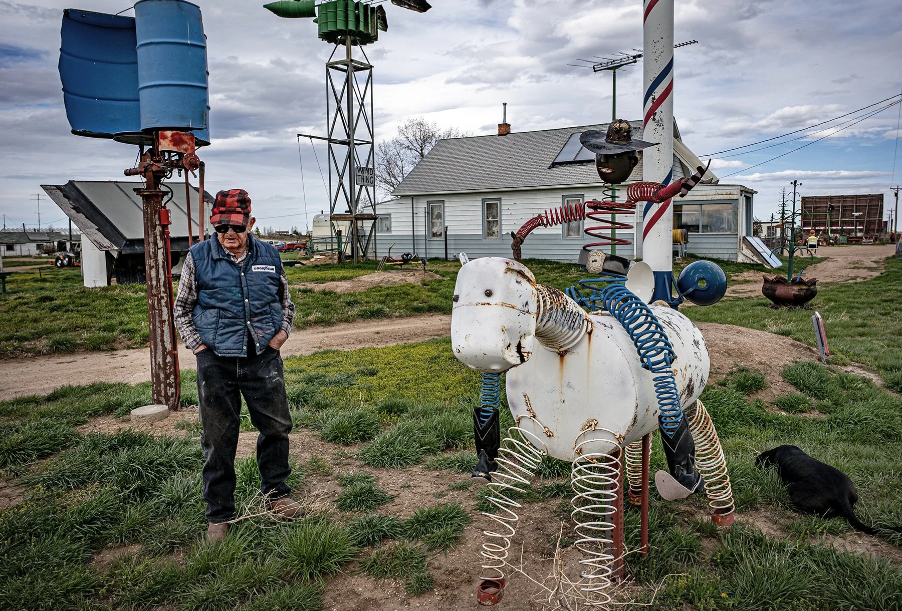 Mel Gould in his sculpture yard along I-80. East of Cheyenne, Wyoming. 2014.
