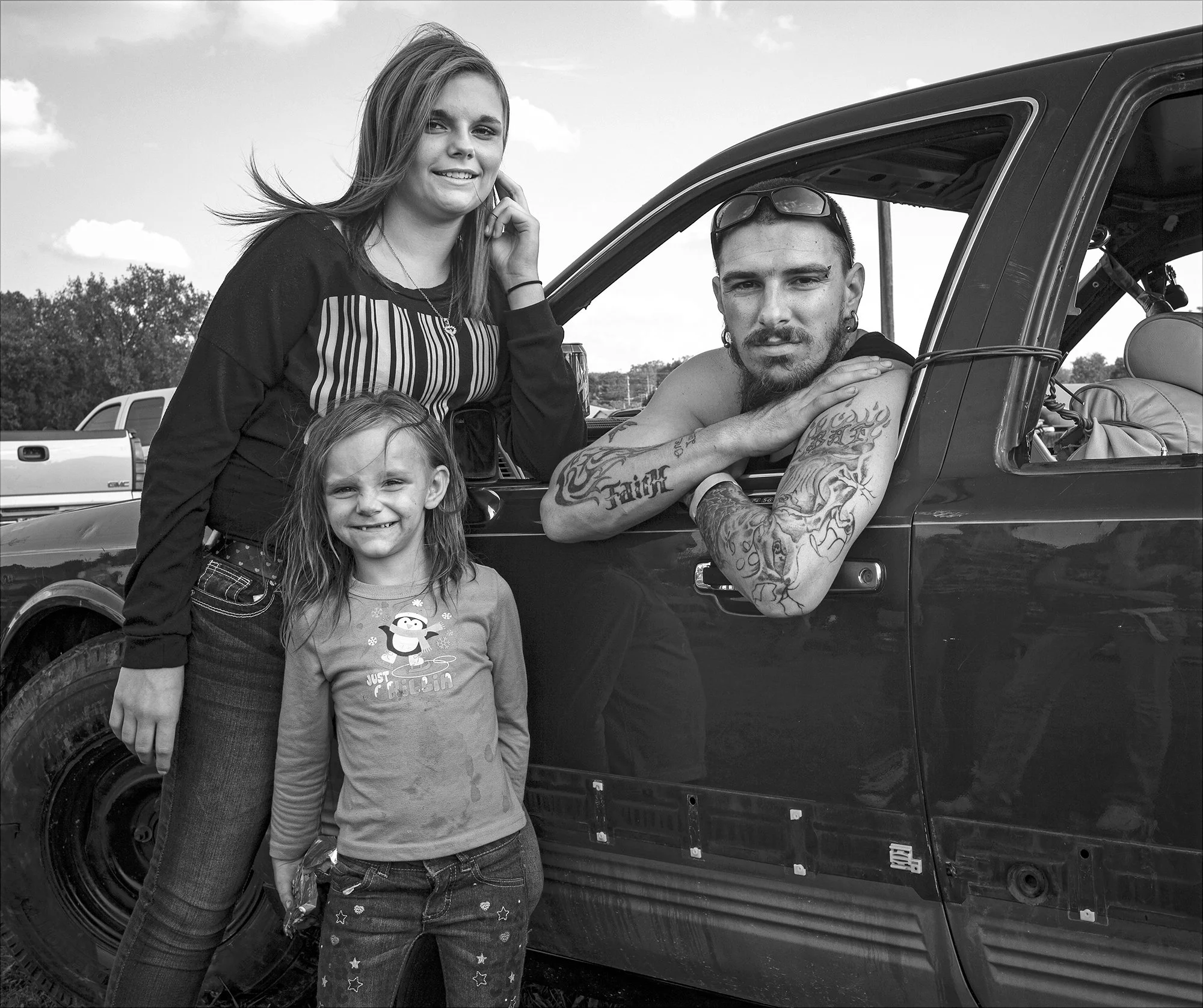 Driver and family, Demolition Derby, Carthage Fairgrounds. 2014.