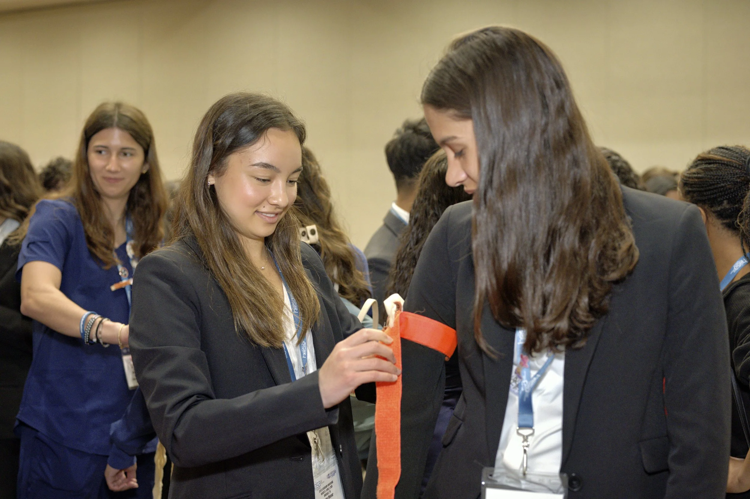 A group of HOSA members participate in a hands-on interactive workshop.
