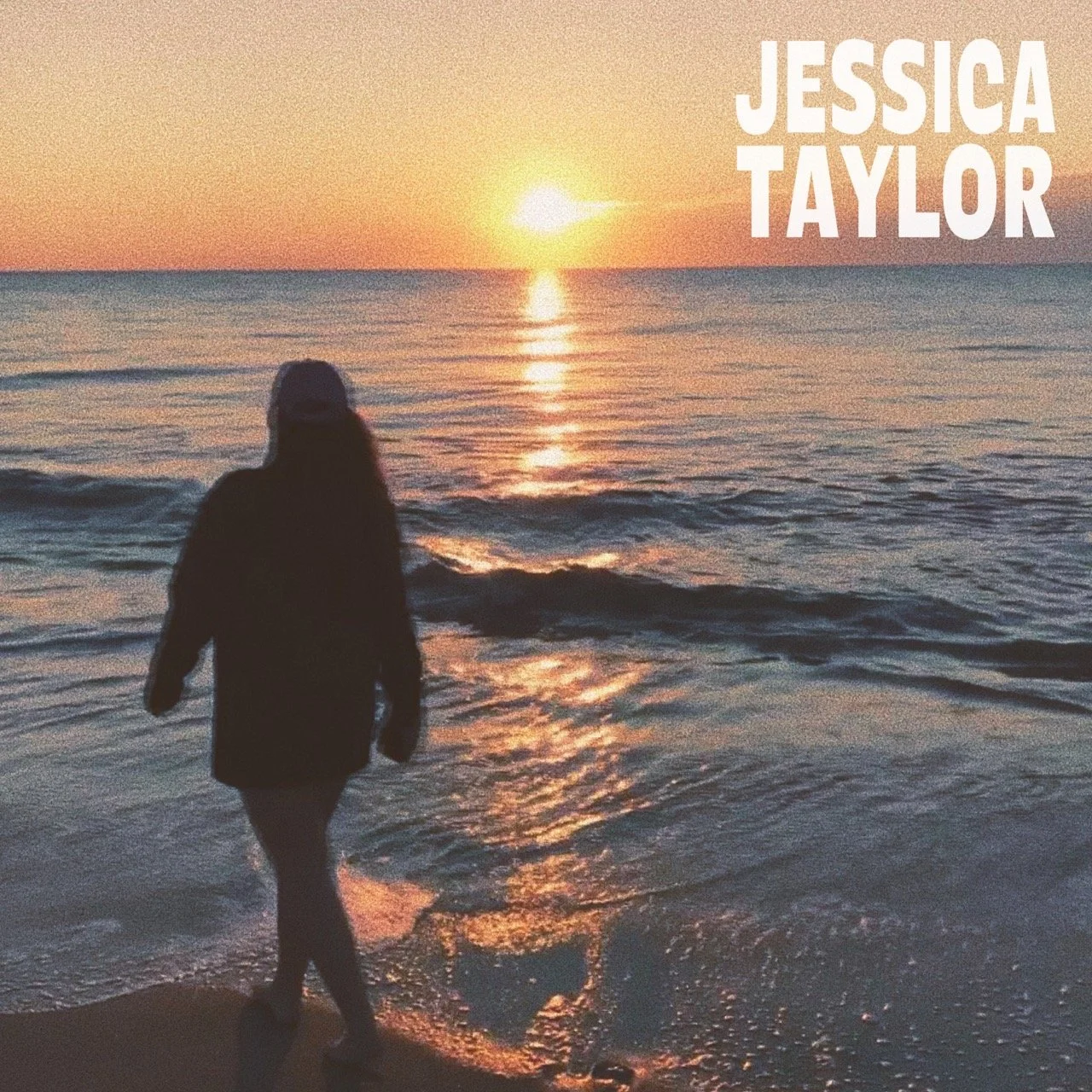 Silhouette of a woman walking along the beach at sunset with the sun over the ocean, and the name Jessica Taylor written in the top right corner.