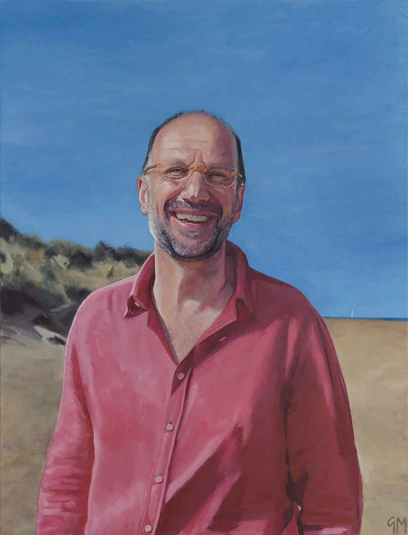 Oil portrait of Edward smiling, wearing a pink shirt at a beach in Norfolk