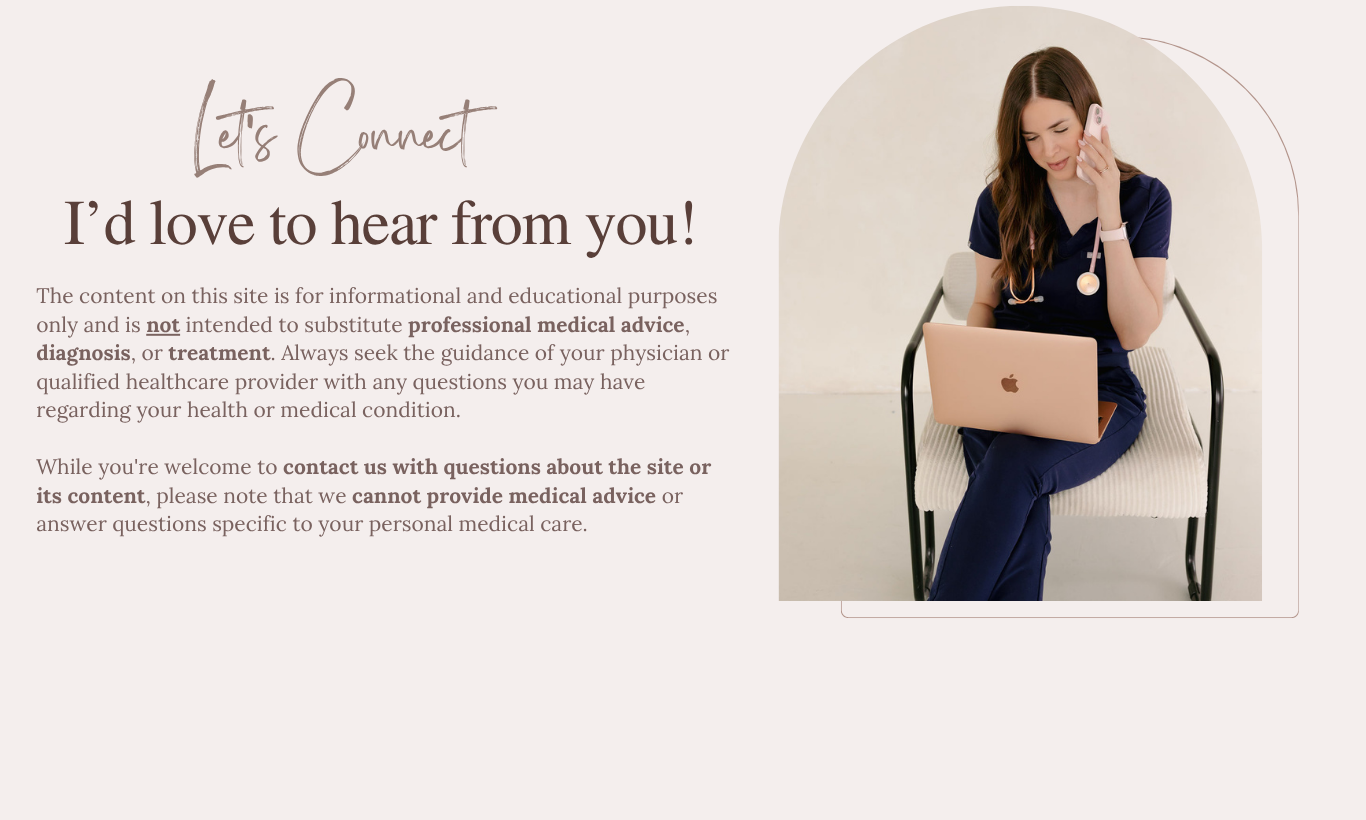A woman in navy medical scrubs sitting on a white chair, speaking on a landline phone while using a laptop, with a stethoscope around her neck.