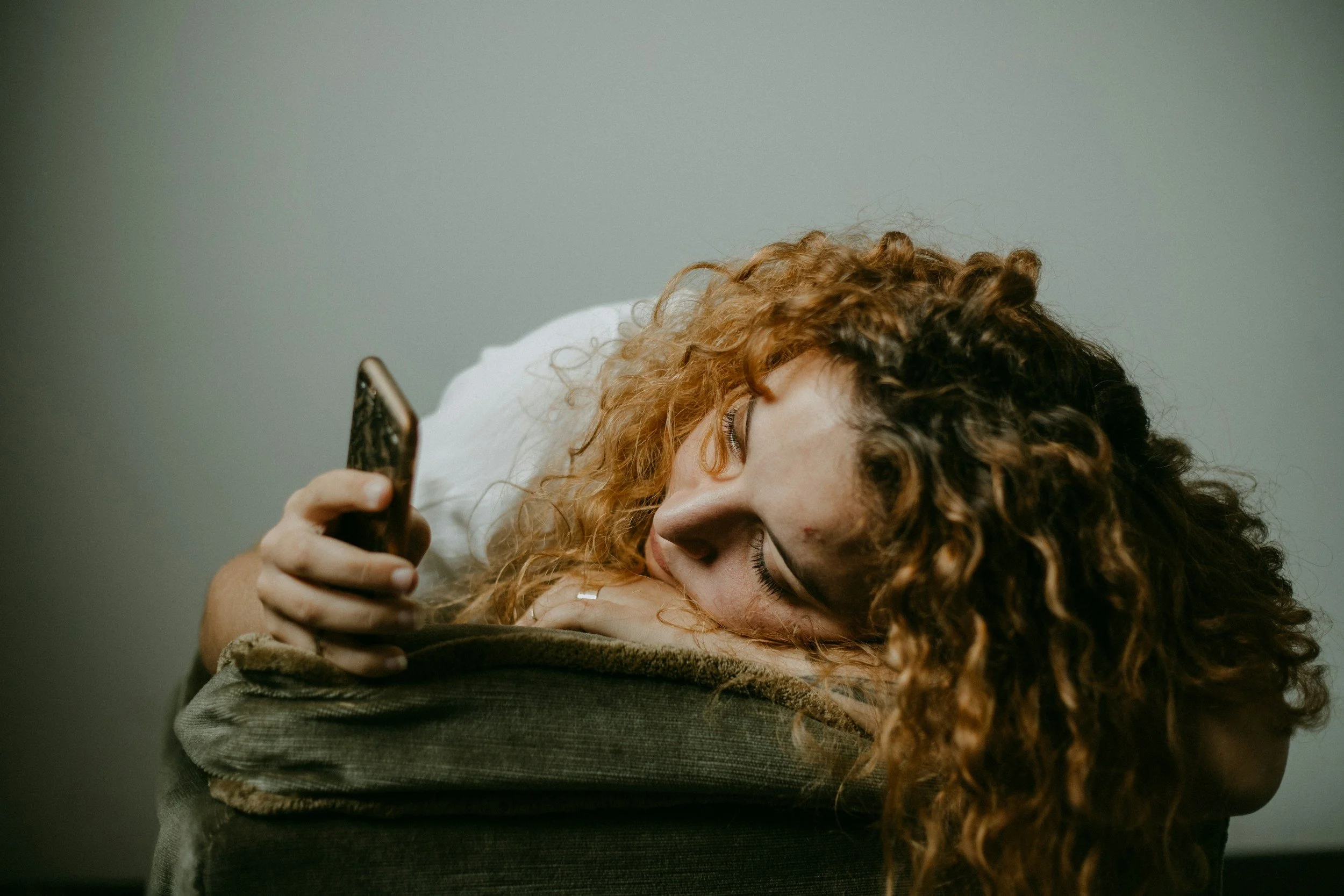 Young adult showing signs of burnout, anxiety, and emotional exhaustion from daily stress