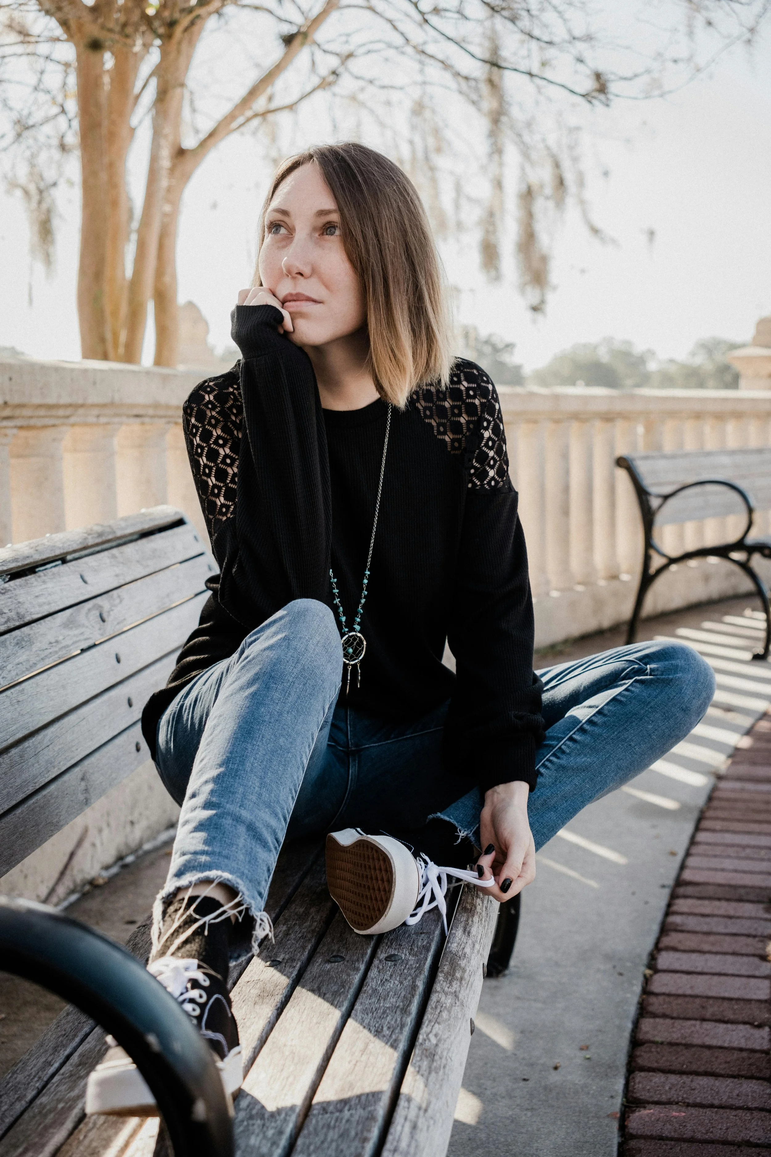 Young adult reflecting during a life transition and thinking about next steps