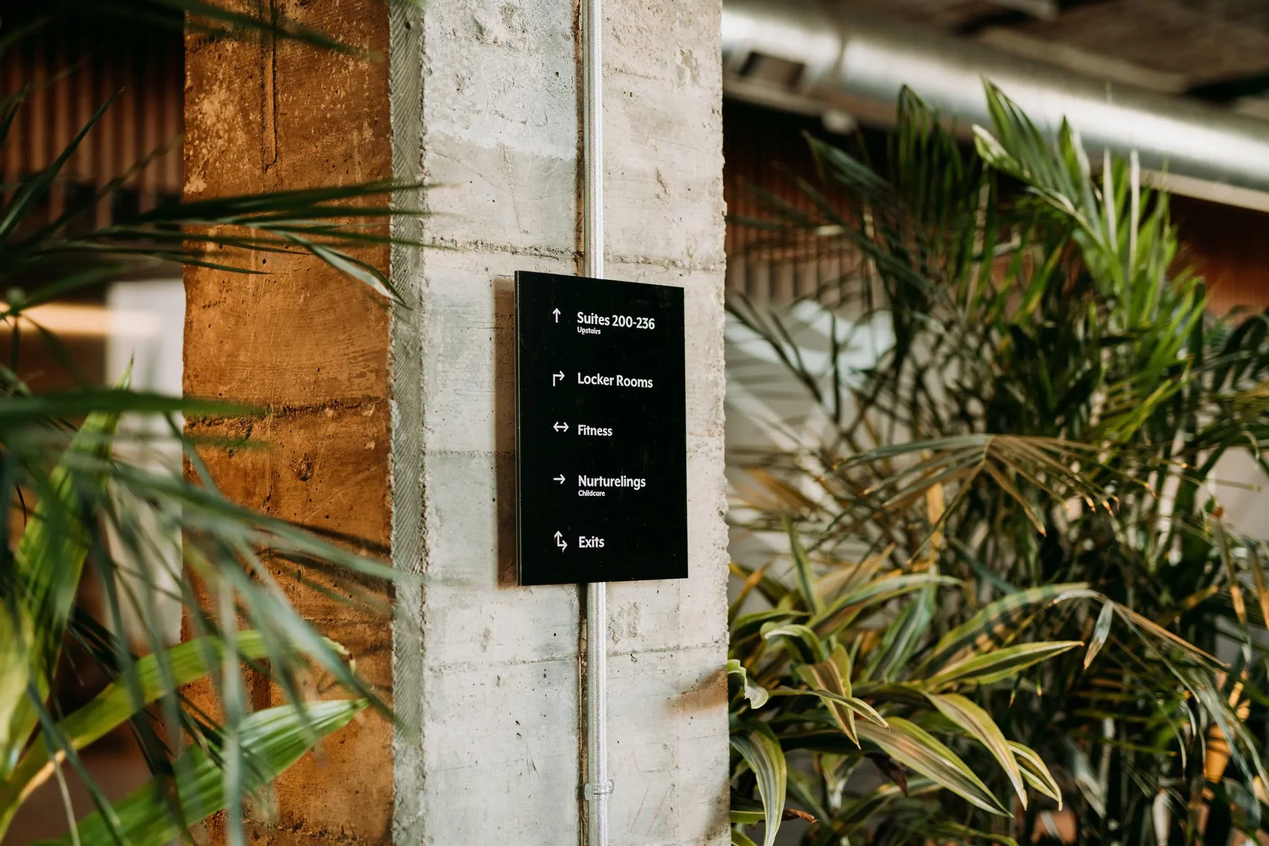 Vicarel-Studios-Nurture-directional-sign.webp