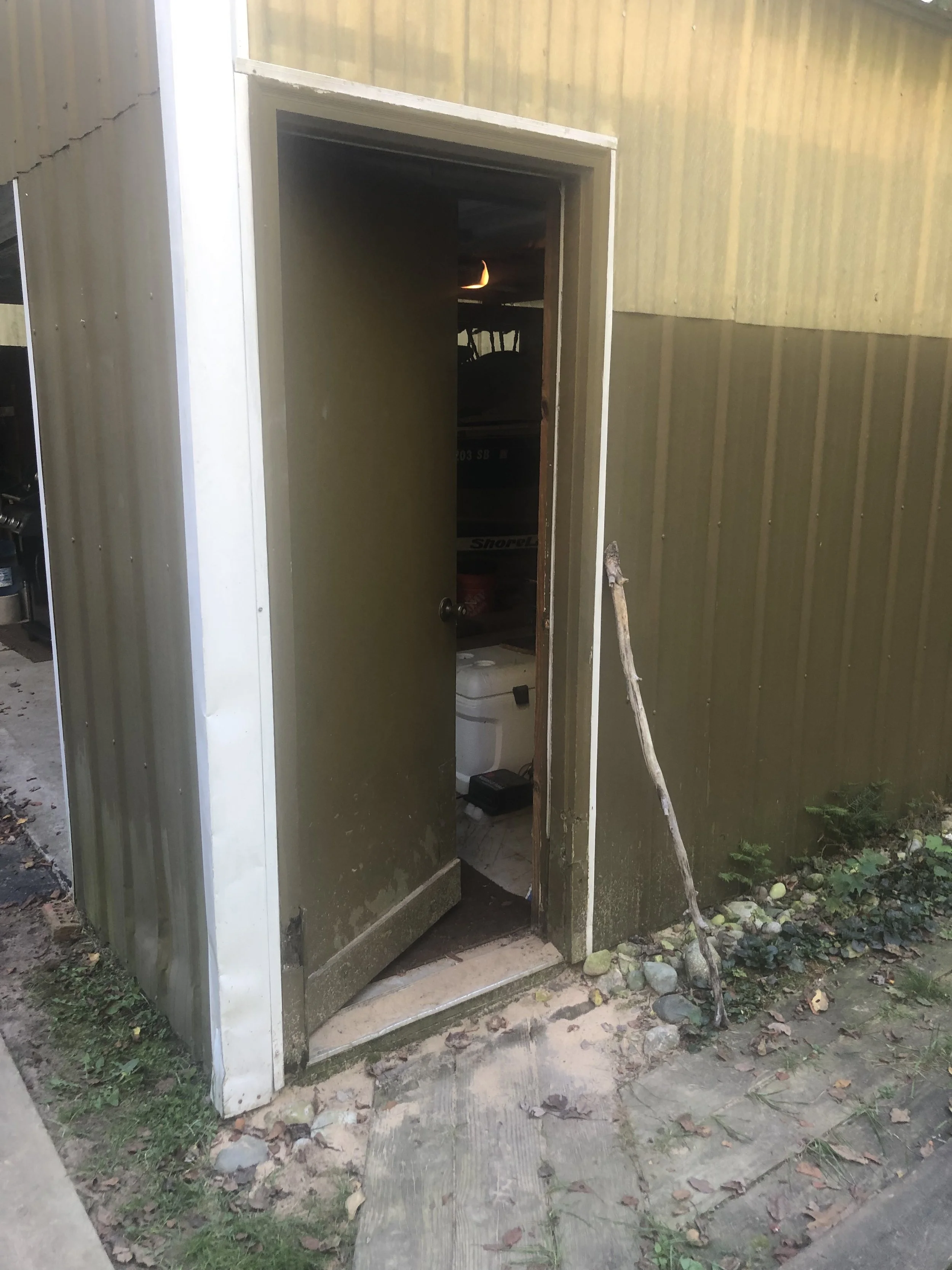 Before replacement of existing pole barn entry door