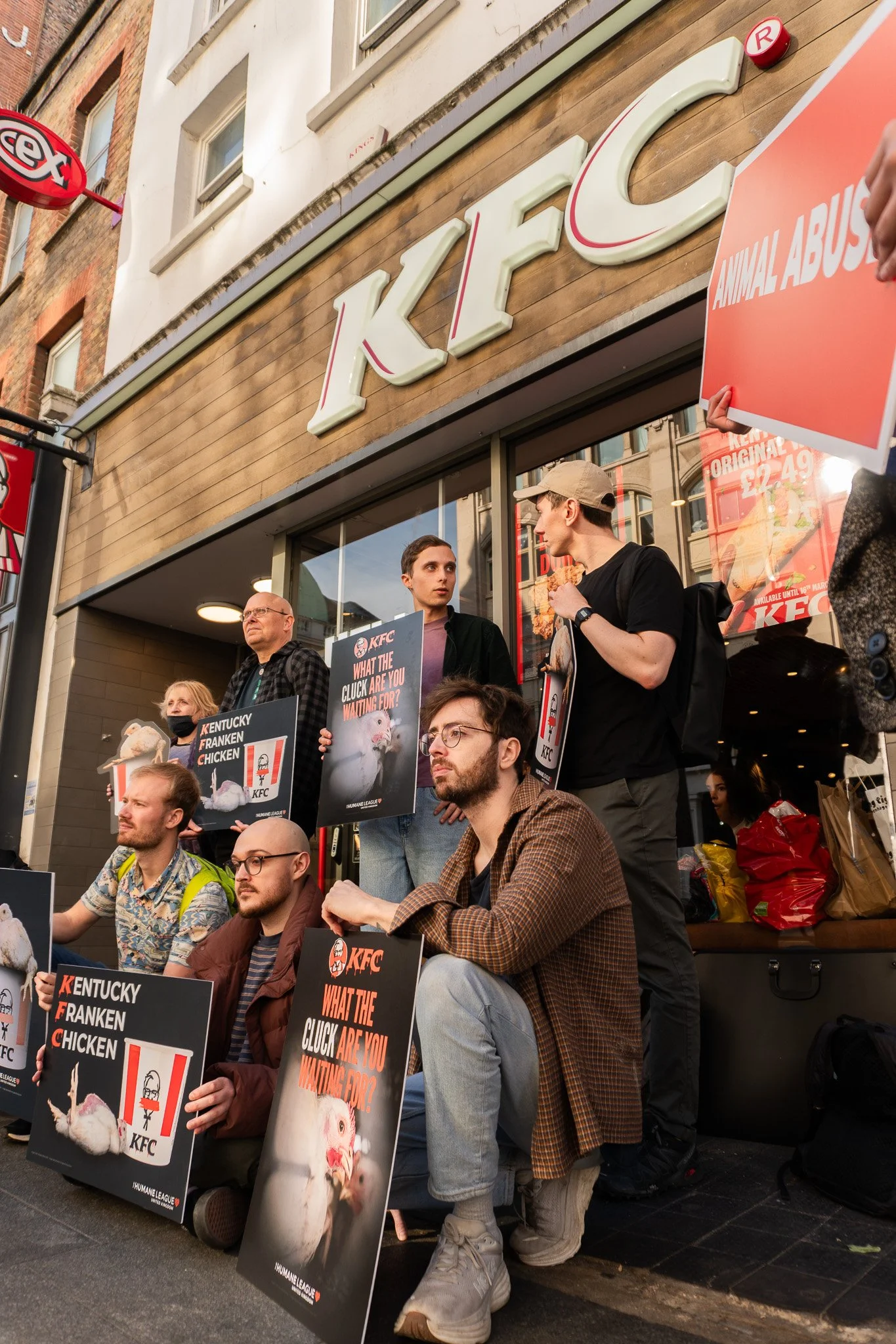 Jack with six other people protesting KFC for their use of Frankenchickens.