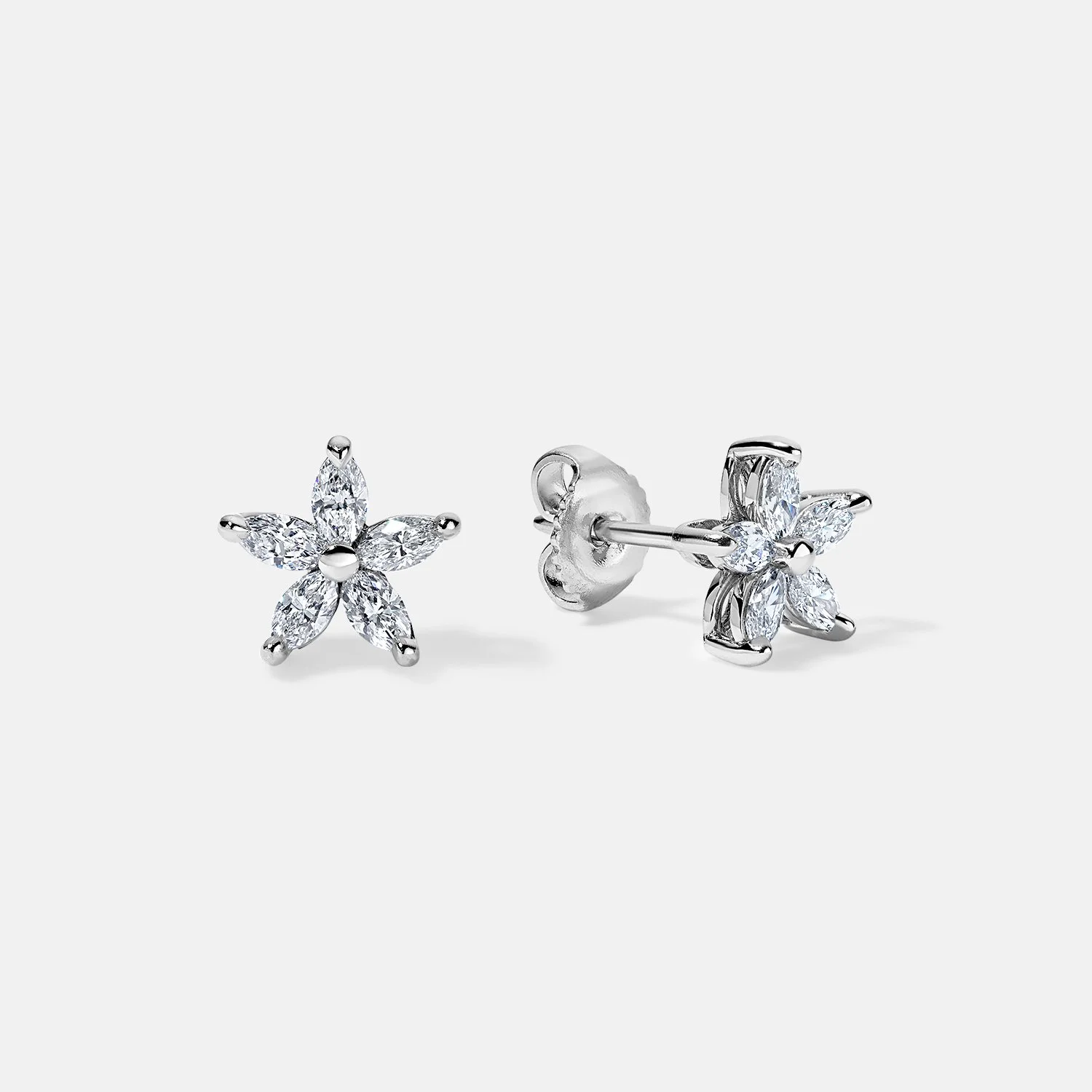 Fairbank Star Studs- natural vs1 D platinum.jpg