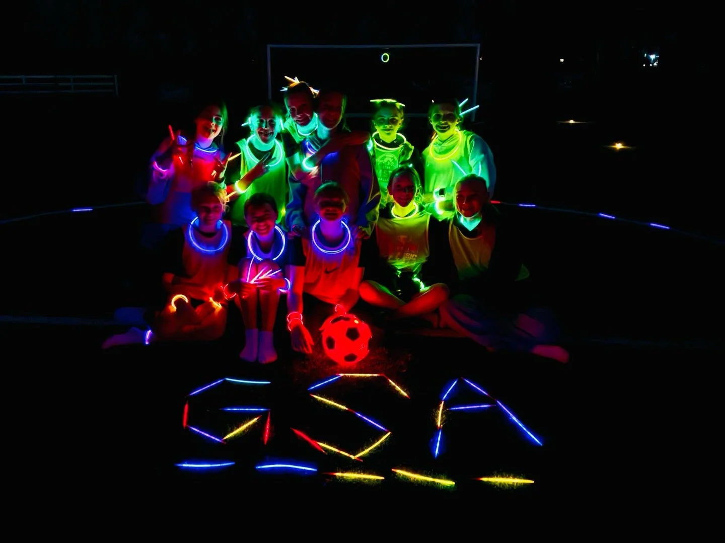 Winter practice is fun!! 2012 Girls playing glow soccer!! Merry Christmas!