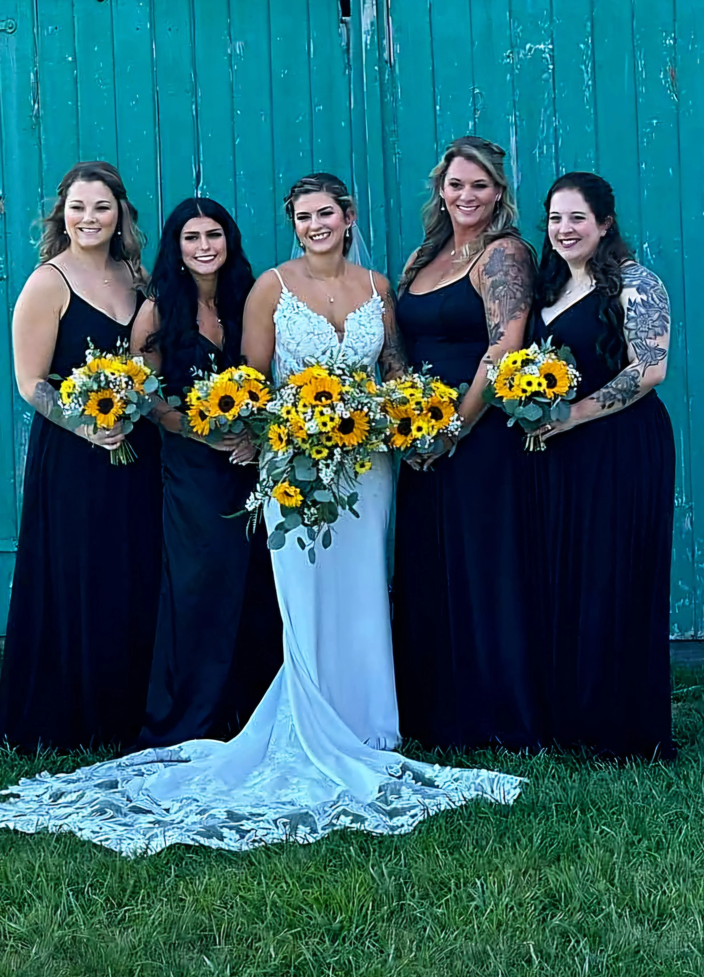 Bridal party with sunflower bouquets