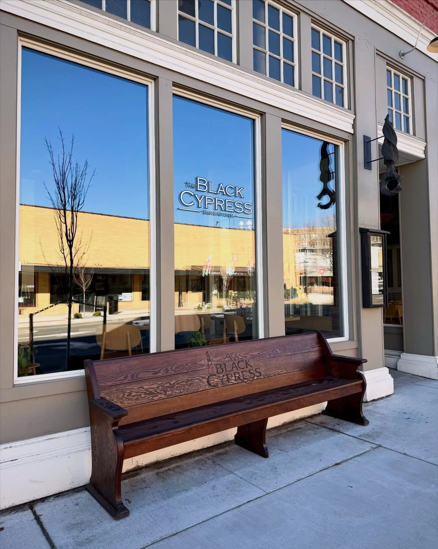 We&rsquo;re loving this custom bench outside The Black Cypress 🖤
Thank you for making downtown look beautiful!