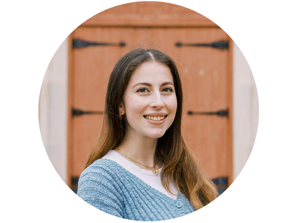 Woman in sweater smiling