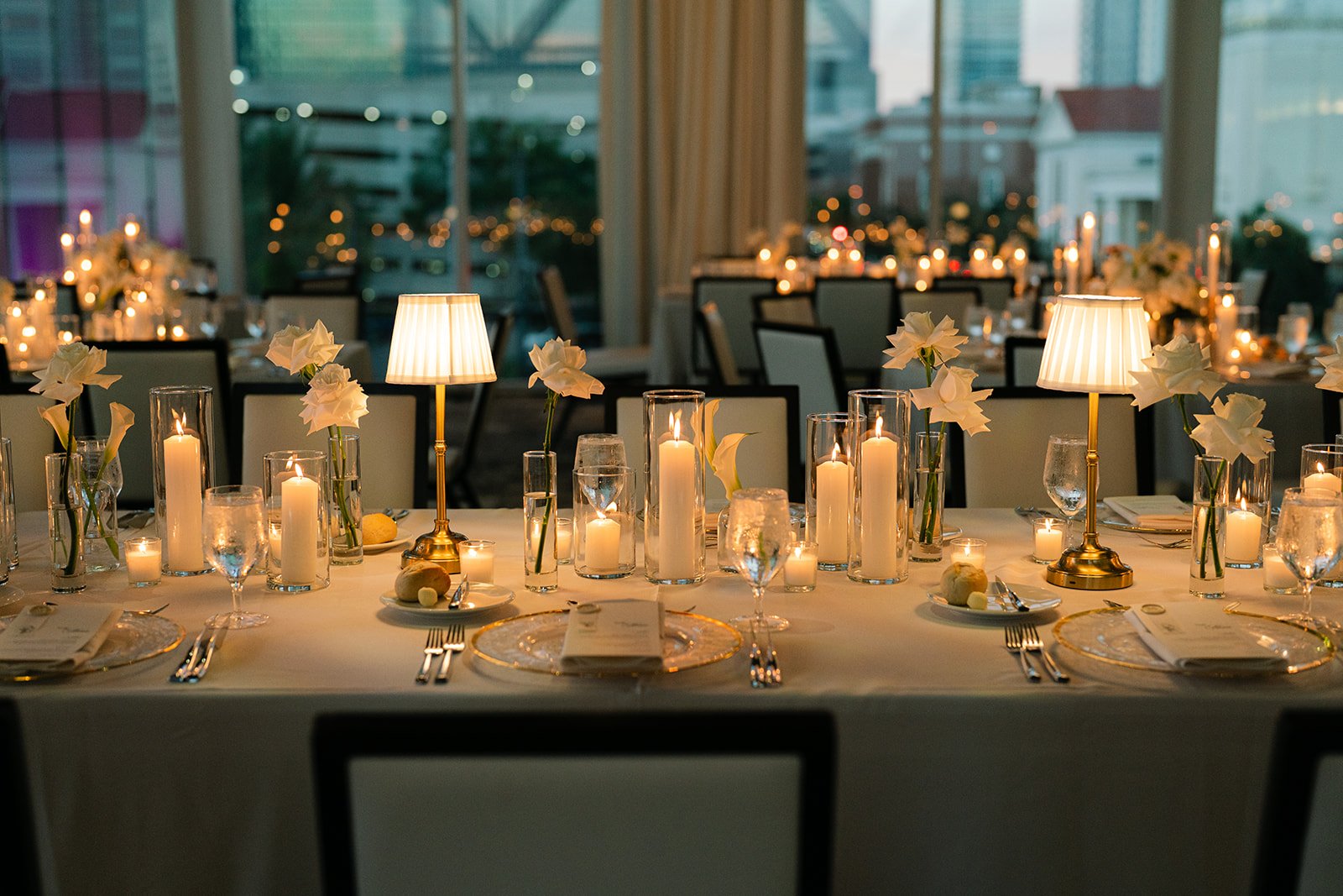 Emerald Gardenia dining table floral design for an elegant celebration event.
