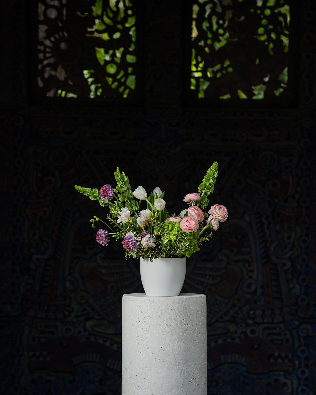 Premium mixed floral arrangement with vibrant seasonal blooms in a colorful, textural composition designed for artistic expression