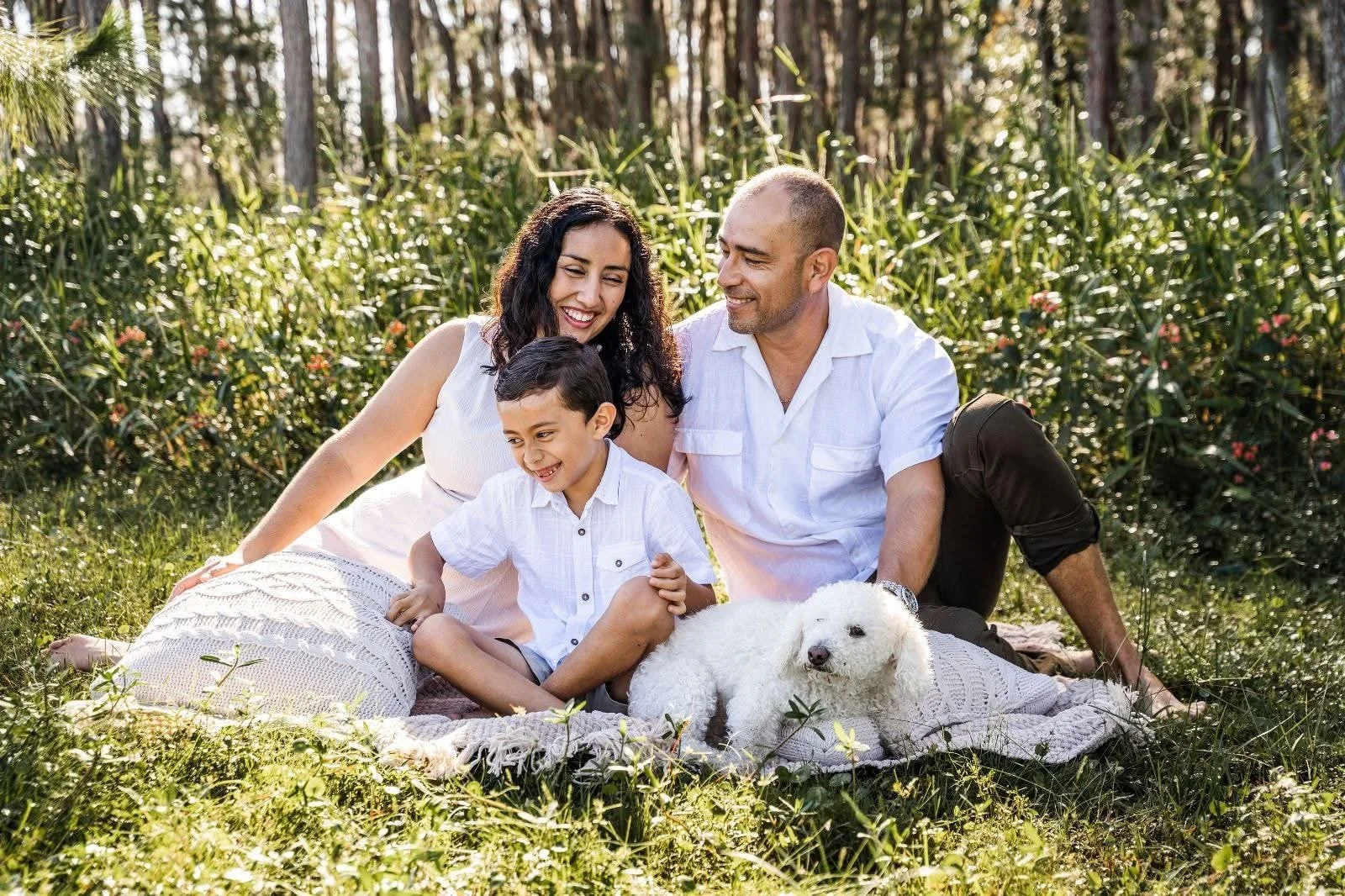 Emerald Gardenia florist owner with family in a candid lifestyle portrait.