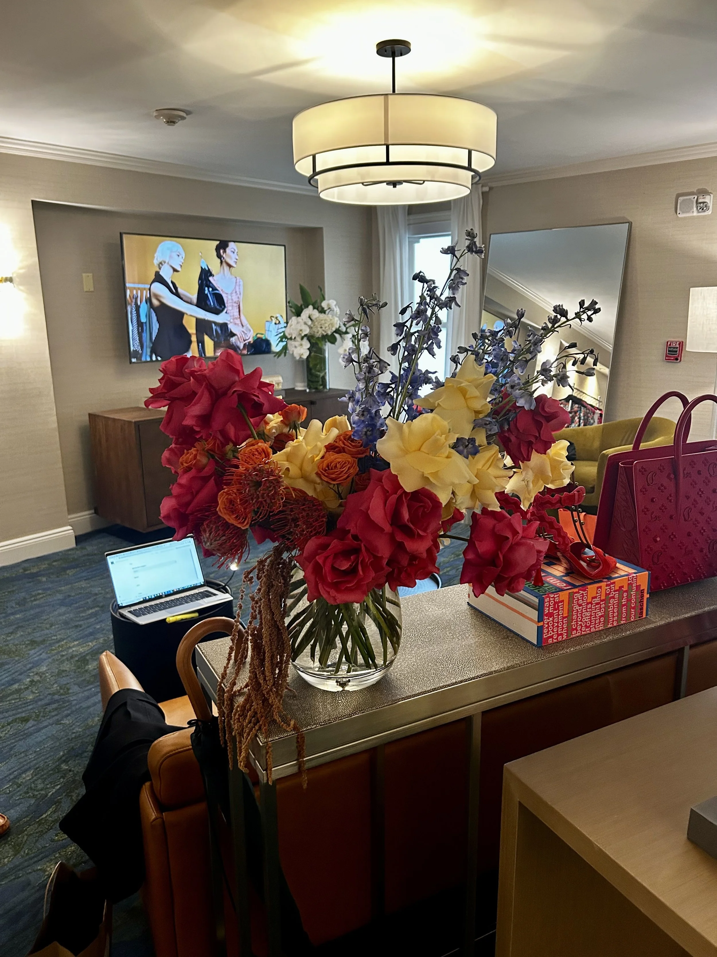 Premium mixed floral arrangement with vibrant seasonal blooms in a colorful, textural composition designed for artistic expression