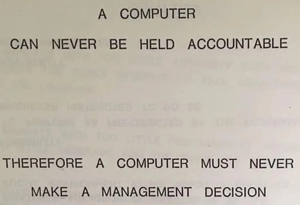 A page from a 1979 IBM manual that reads "a compuer can never be held accountable therefore a computer must never make a management decision"