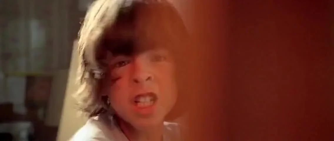 A screen capture from Close Encounters of the Third Kind where Brad Neary (played by Shawn Bishop) yells at Roy and calls him a "crybaby"