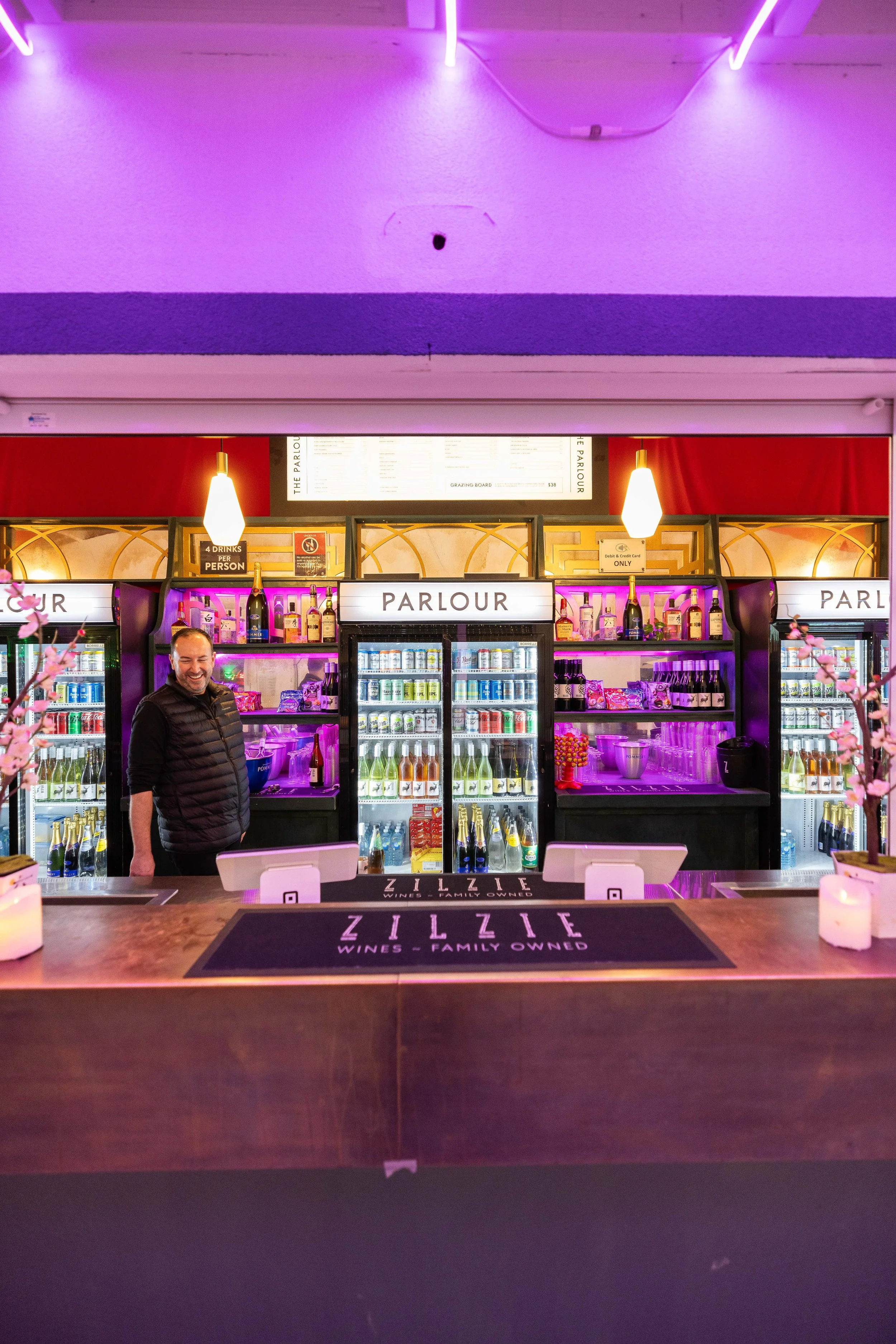 bar at Spiegeltent with drinks behind and nice ambient lighting