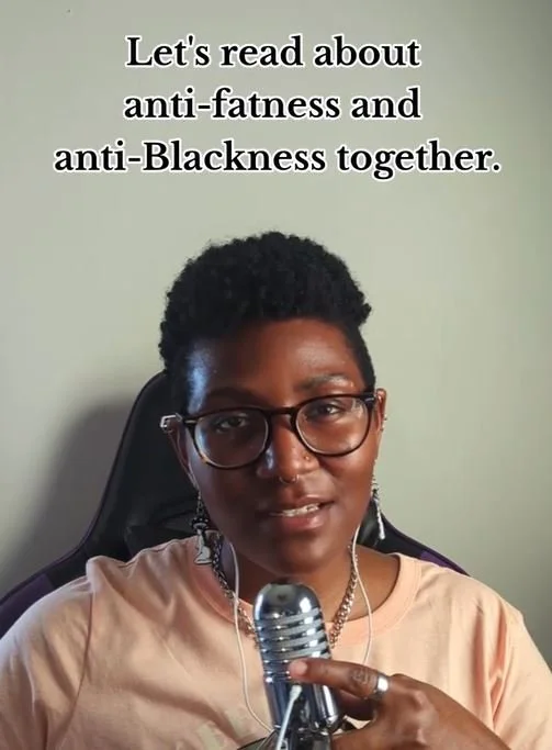 Kenyatta looking into the camera, holding a microphone. Above her the text reads "Let's read about anti-fatness and anti-Blackness together."