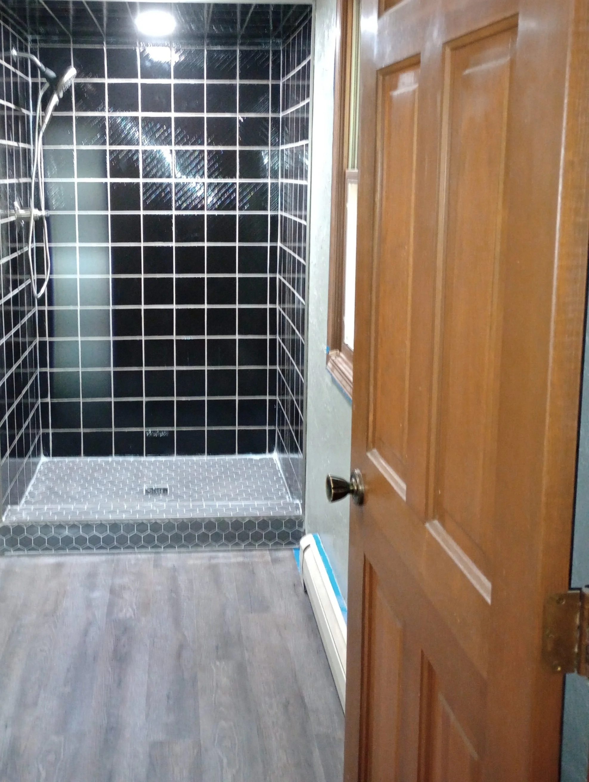 Modern tiled shower and bathroom renovation