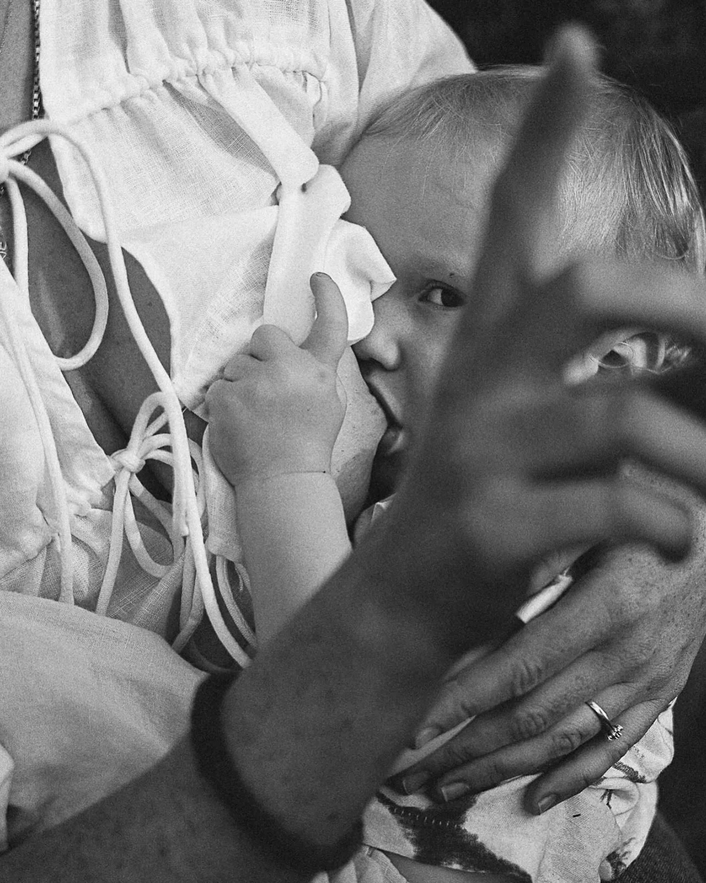 My fave shot from a recent MOTHERHOOD session with the beautiful @torilindsay. The eye contact, the hair band on a busy mumma&rsquo;s arm, the dying days of their breastfeeding journey captured forever. Real life, quiet moments and the magic of first