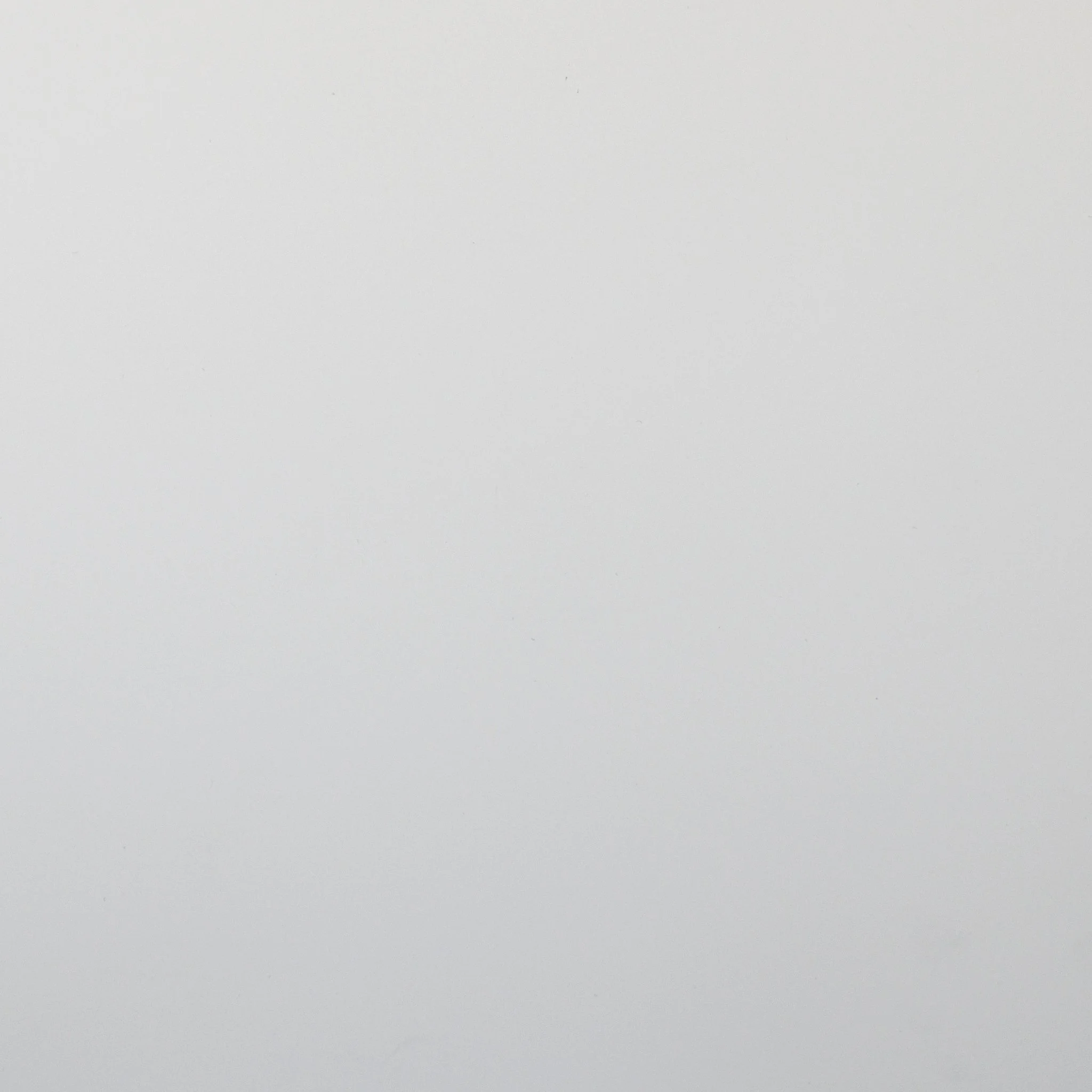 A plain white background with no visible objects or details.
