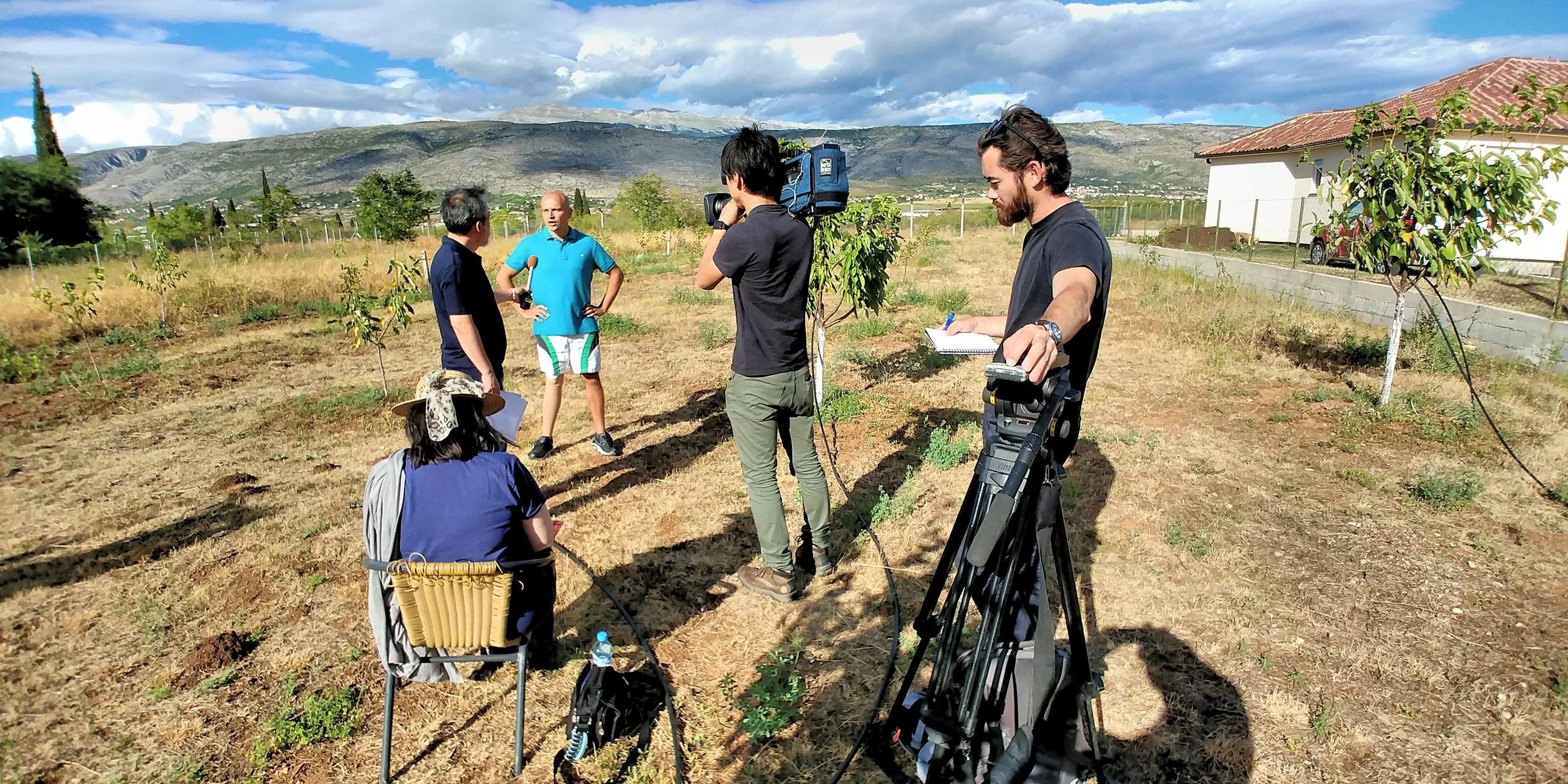 Behind the scenes of the documentary on mine victims, produced with Tokyo Broadcasting Systems – ViEdo - full video production, on-ground filming, drone aerials, location management, fixer services, and permits coordination in Bosnia.