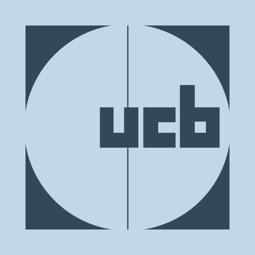 Graph with the text 'UCB' in the center, divided into four quadrants with dark and light blue sections.