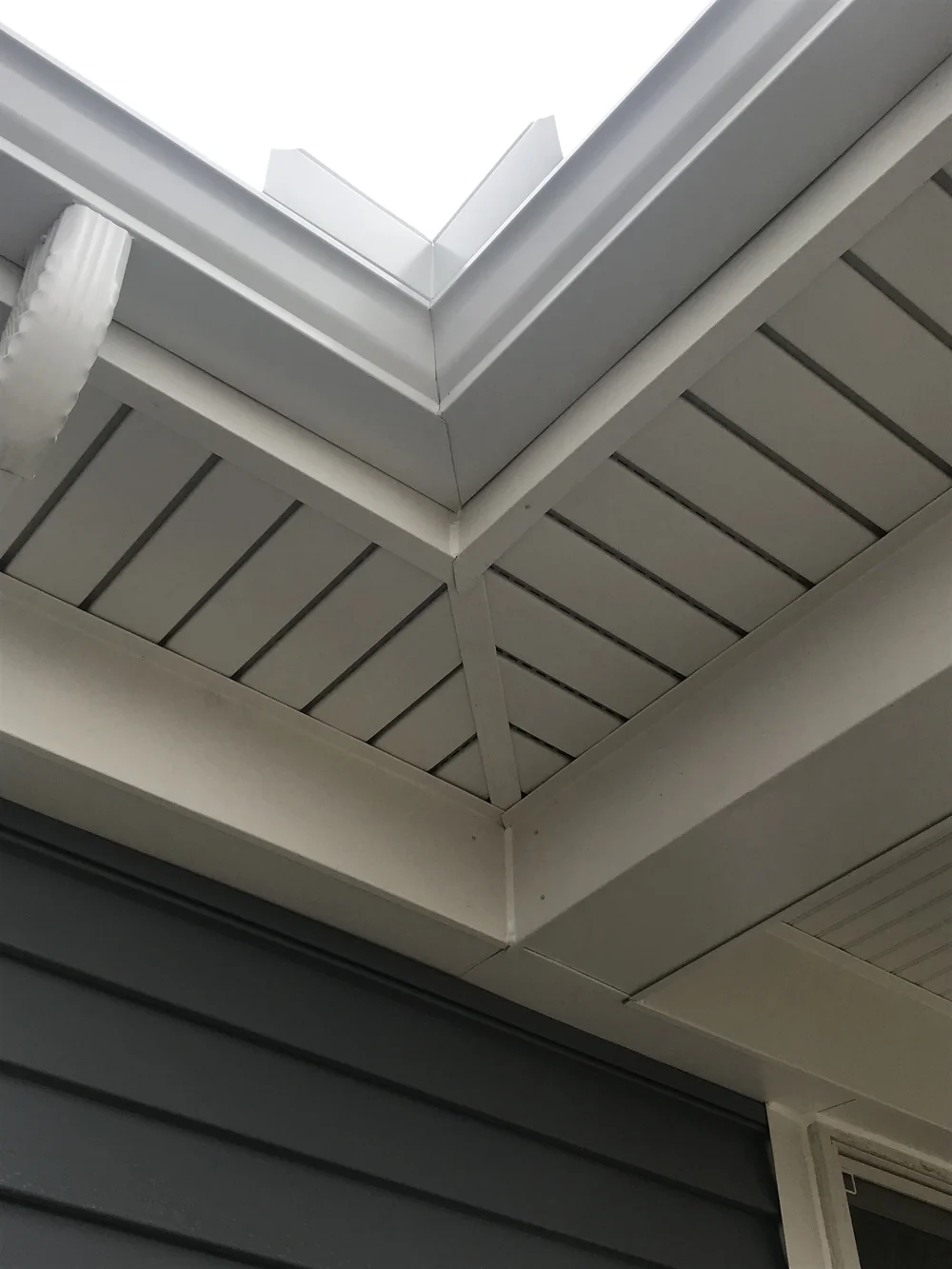 Commercial exterior painting surface preparation by NEXT Exteriors in Macomb County