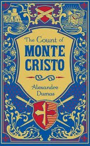 Book cover titled 'The Count of Monte Cristo' by Alexandre Dumas, featuring a blue background with gold and red decorative elements and a shield emblem.