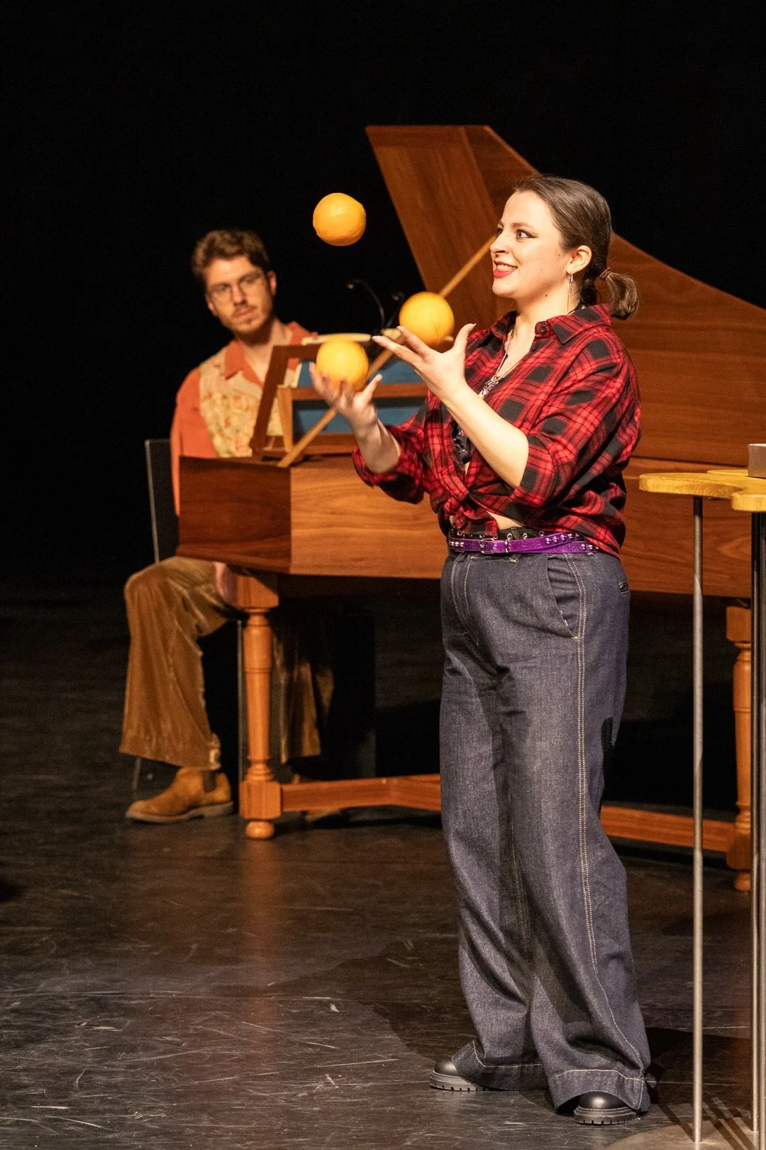 Despina juggling oranges
