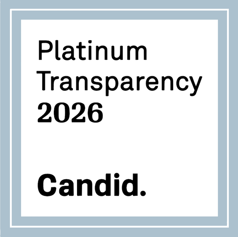 A certificate or award with a light blue border, containing black text that reads "Platinum Transparency 2026 Candid."