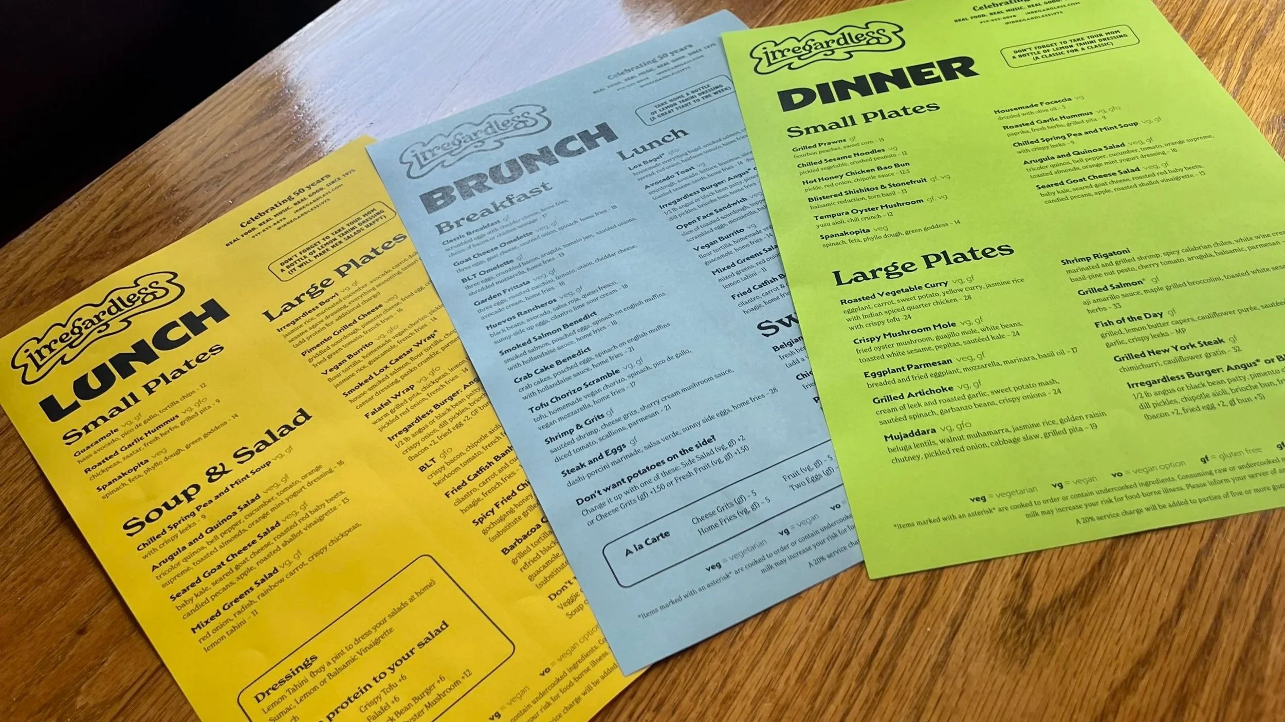 lunch, brunch, dinner menus on a wooden table