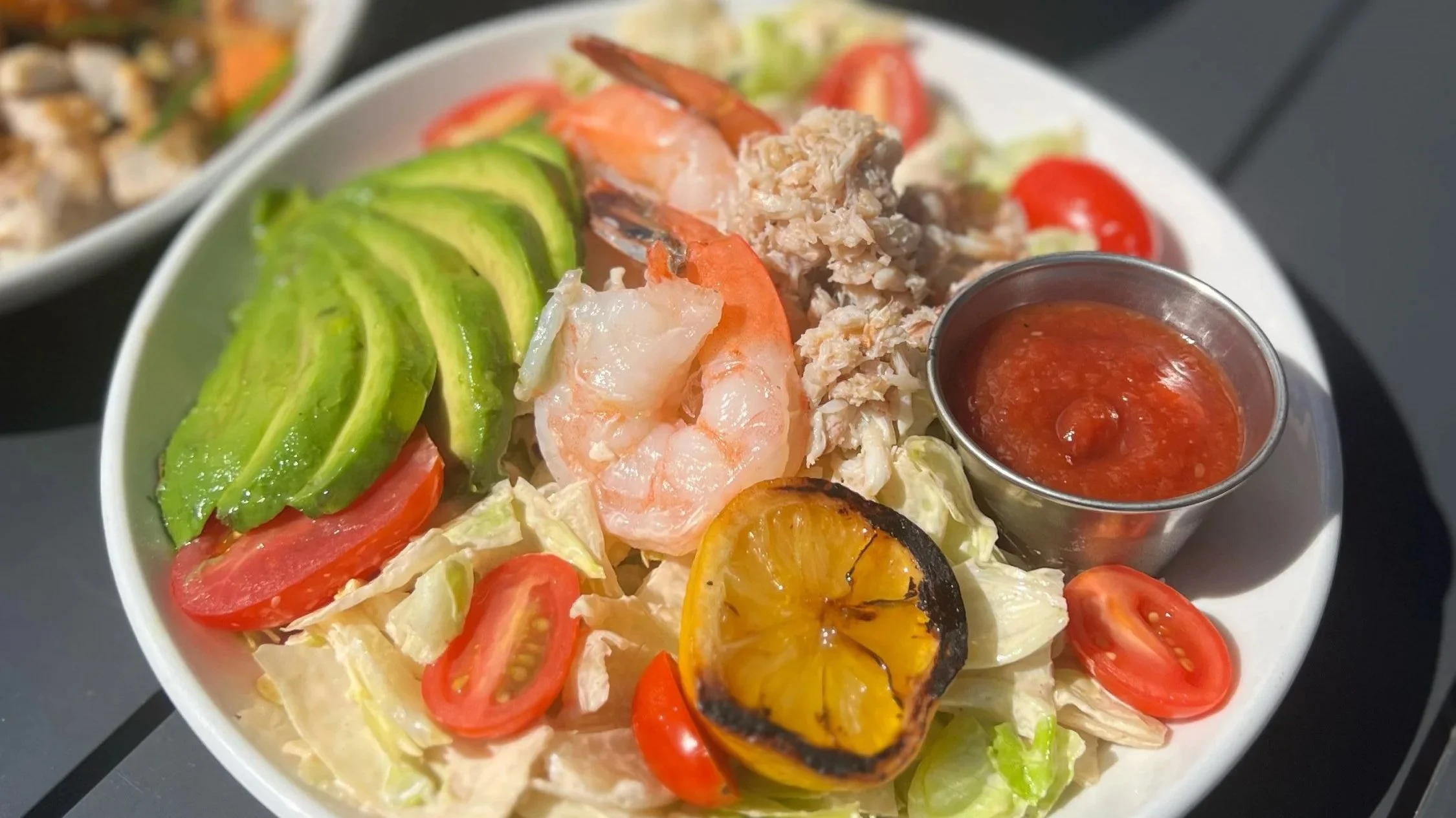 louie salad: cocktail shrimp, fresh crab, chopped iceberg, cherry tomato, 
grilled lemon, avocado, hardboiled egg, thousand island (gluten free)