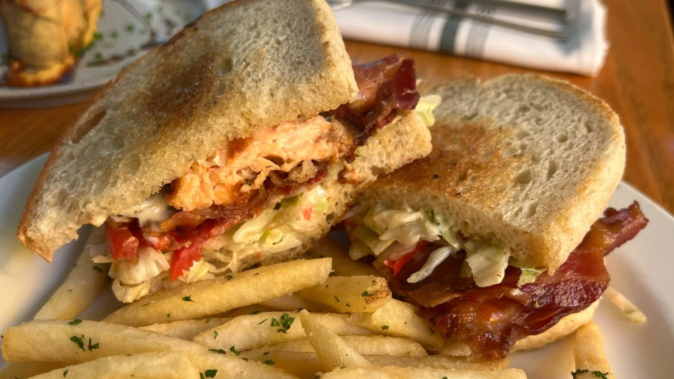 Salmon BLT: grilled salmon, bacon, lettuce, tomato, basil aioli, toasted sourdough (gluten free option)