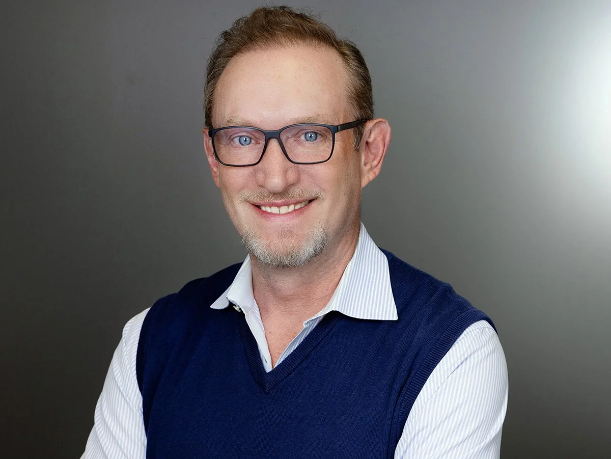 Chad Guillory, Director of Partnerships & Growth against a dark grey background.