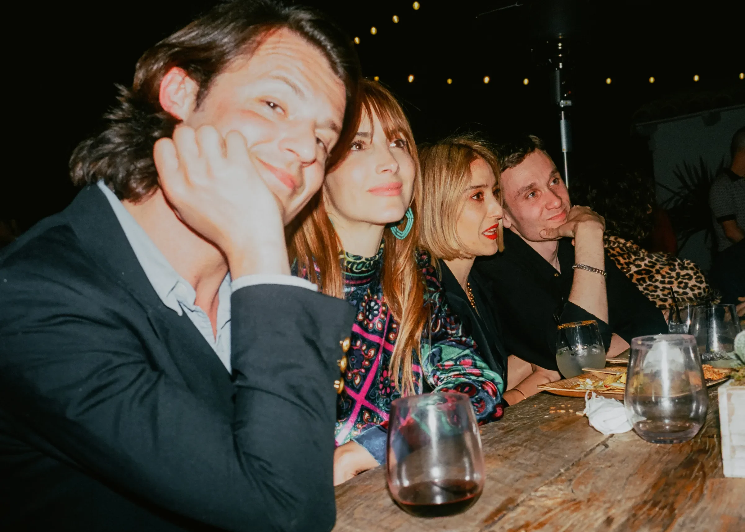 Wedding guests at the reception dinner at Hummingbird Nest Ranch in Santa Susana, California, photographed on 35mm film with flash.