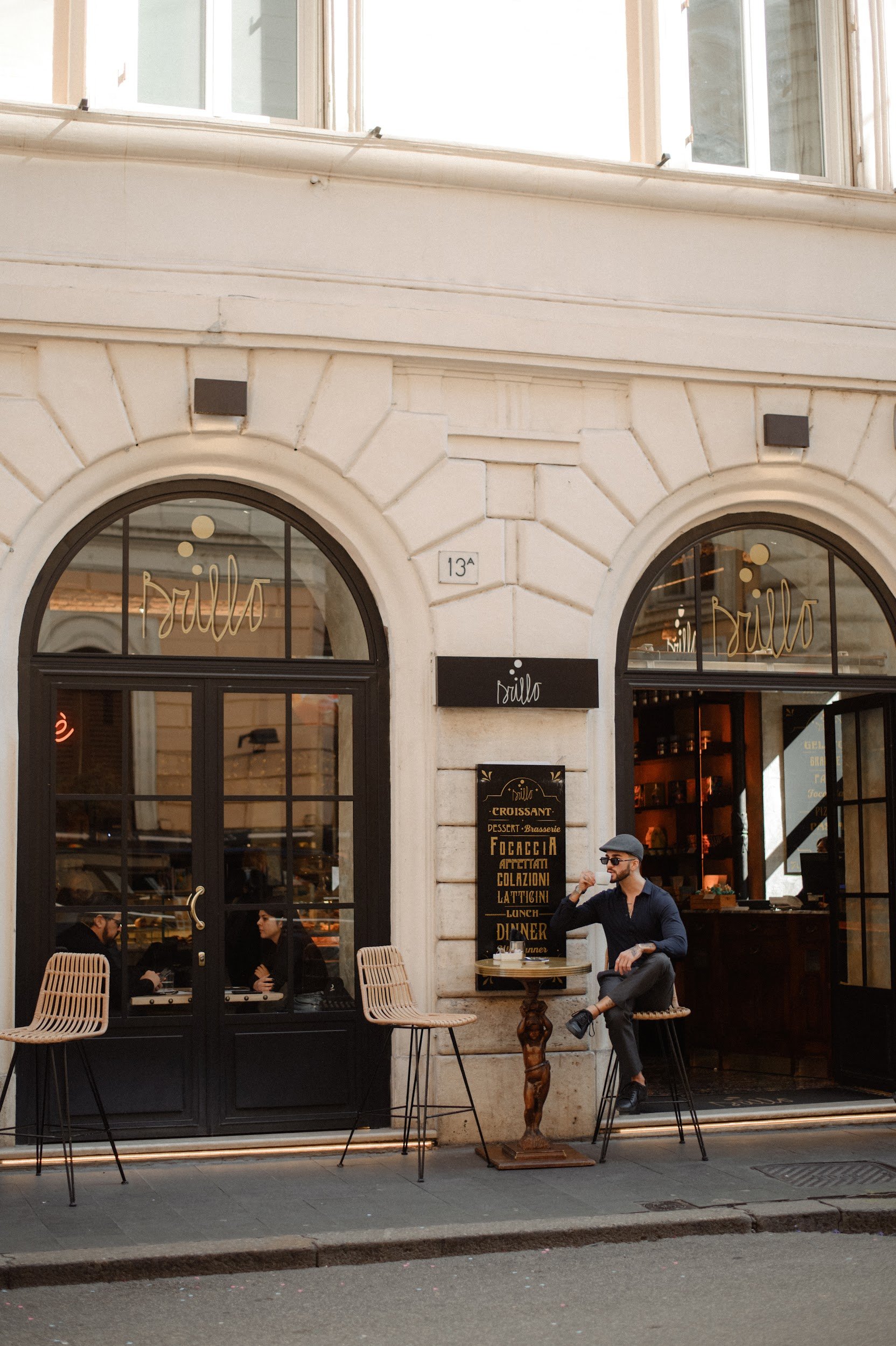 Architectural detail in Rome with classic café facade and timeless Italian atmosphere