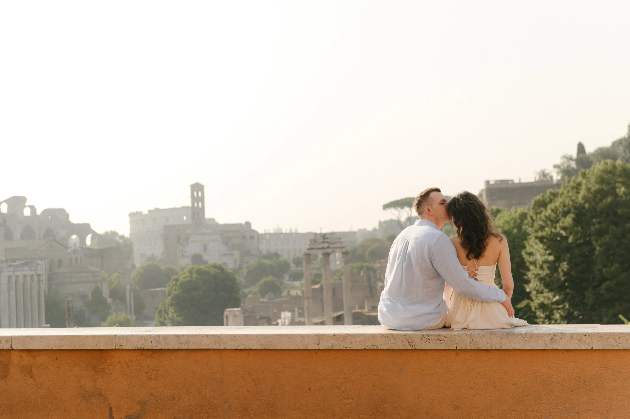 Romantic couple photoshoot in Rome with city view in the background