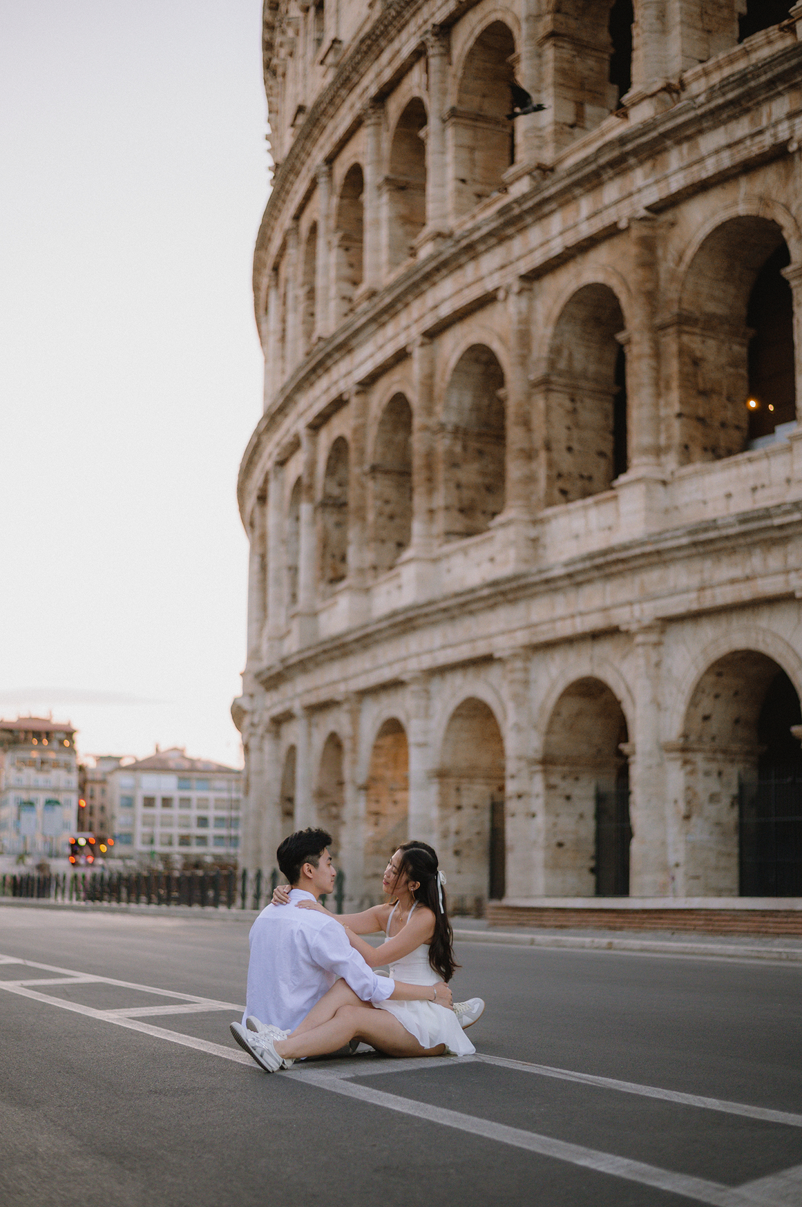 Sunset couple photoshoot in Rome with Colosseum view
