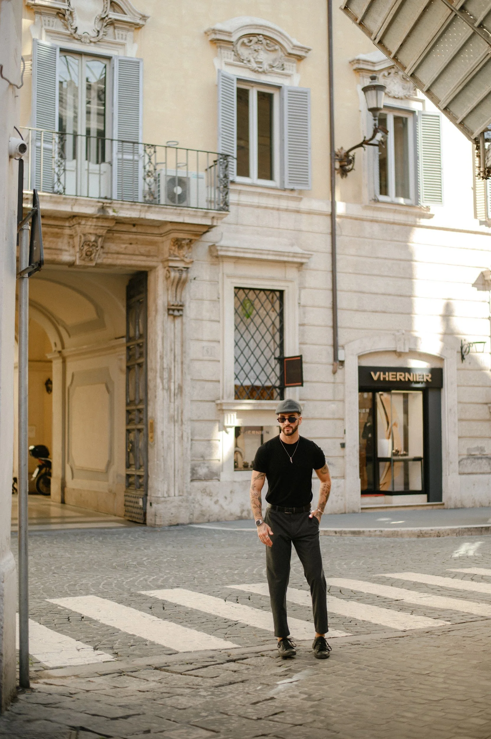 Moment in Rome with a man walking through sunlit historic streets