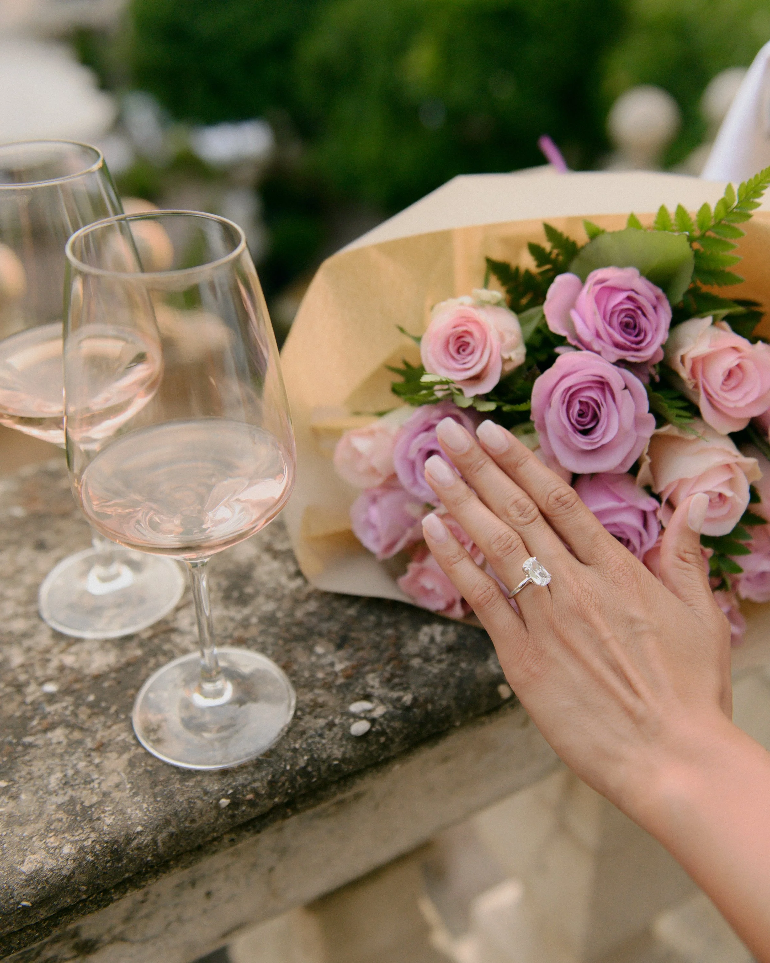 Pink roses bouquet with engagement ring during a proposal photoshoot in Rome