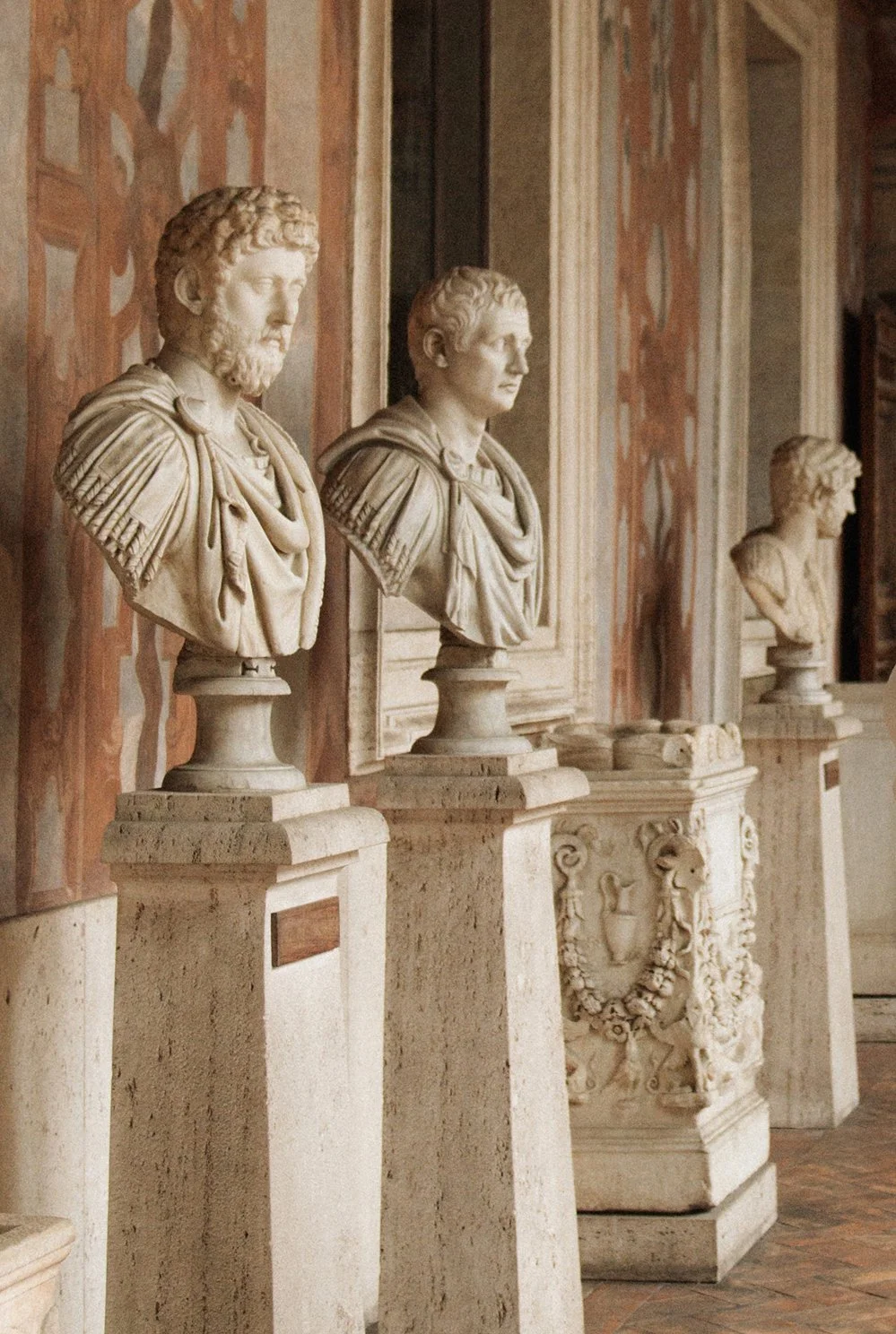 classical sculptures inside Palazzo Altemps in Rome proposal location