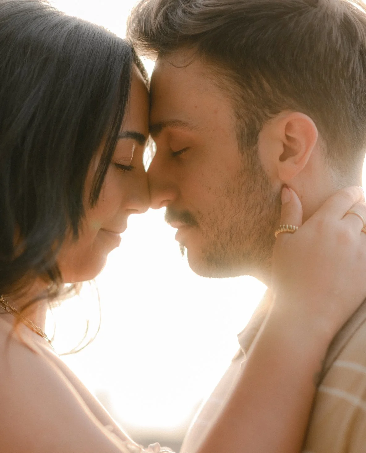 Close up of couple touching foreheads, emotional moment during couple photoshoot in Rome
